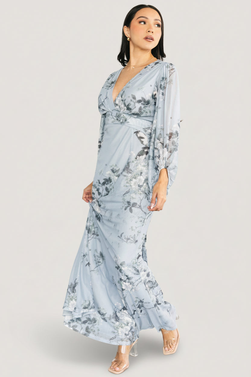 Studio shot of the Beckham Maxi Dress displaying overall silhouette, pleated bust detail, waist tie and floral placement.