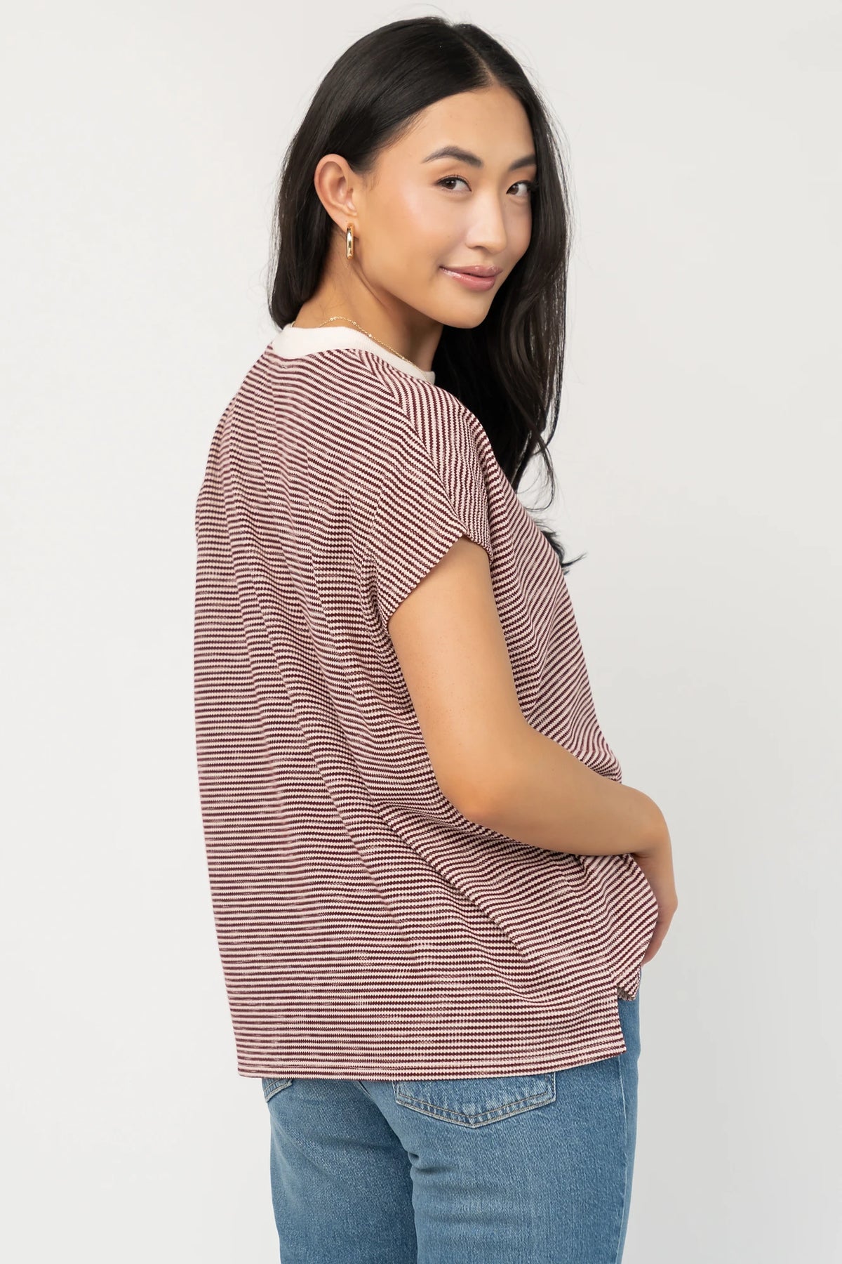 Millie Striped Top in Burgundy + Ivory with round neckline, short sleeves, side slits, and asymmetrical hem.