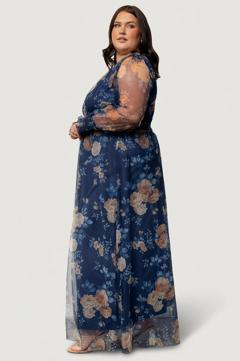 Full-length image of Layla tulle maxi dress on mannequin highlighting pull-over fit, smocked waist and bump-friendly silhouette with soft lining.