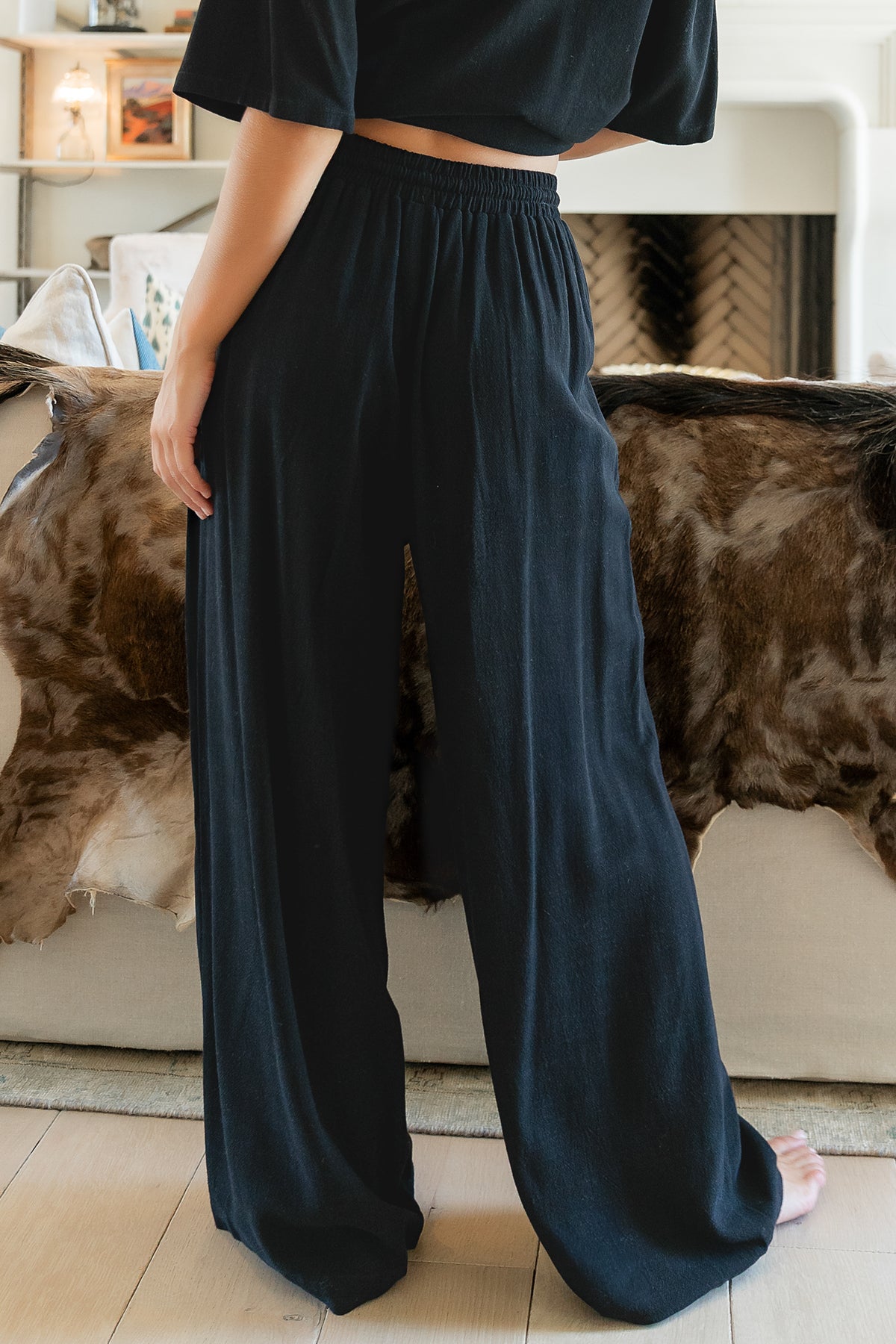 Styled outfit shot of the Timbre Matching Set in black paired with minimal accessories for a polished, versatile look.