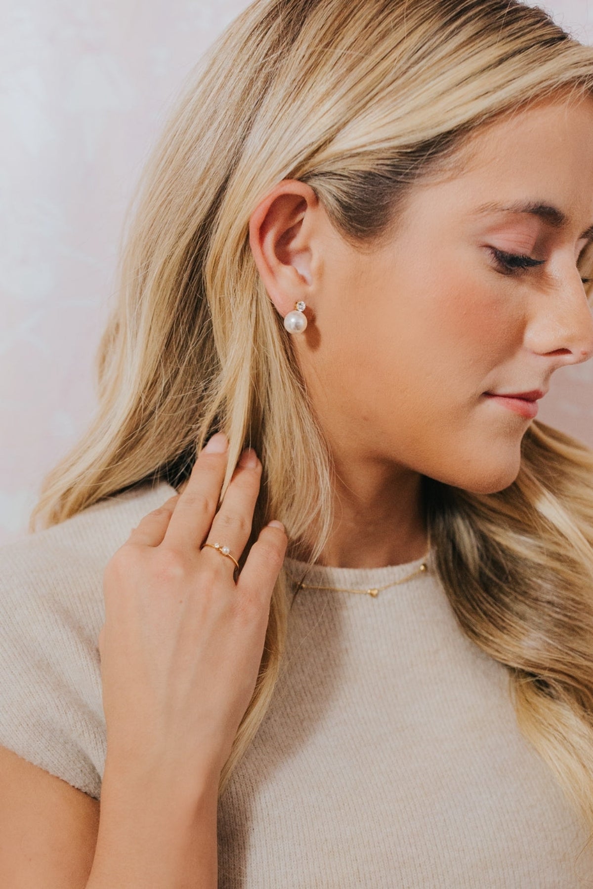 Pair of gold-plated Molly pearl stud earrings displayed together to show scale, 4mm top stud and 10mm cultured pearls.