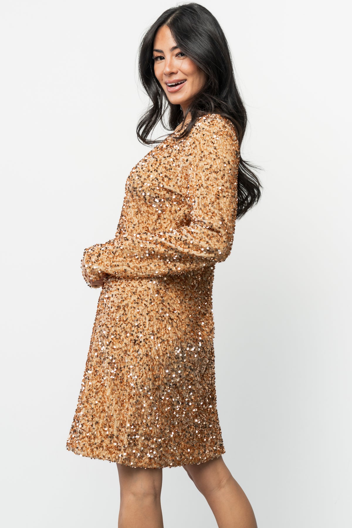Sleeve and fabric detail of Mira gold sequin dress showing velvet texture, sequin coverage, and the smooth interior lining for comfort.