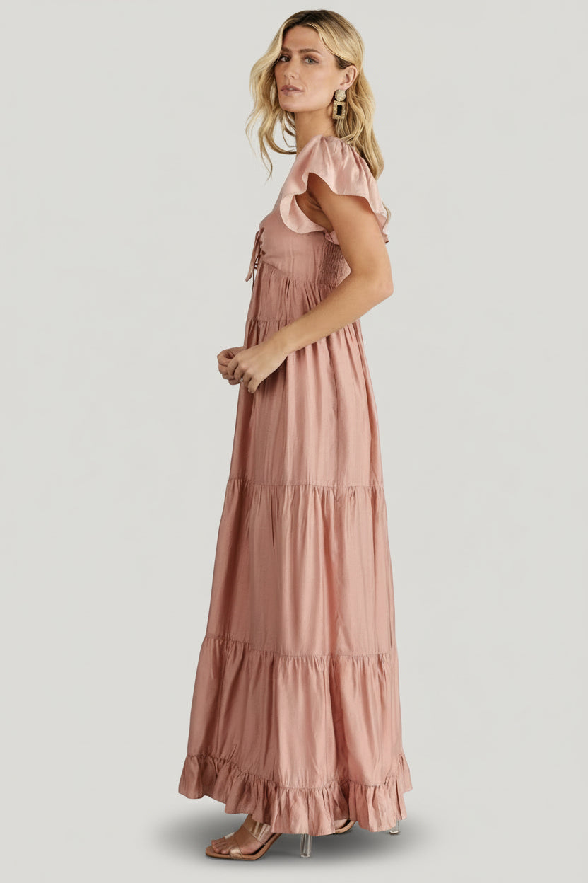 Detail image of Agatha Maxi Dress fabric and construction in dusty mauve, showing lining, seam work and soft rayon-polyester blend texture.
