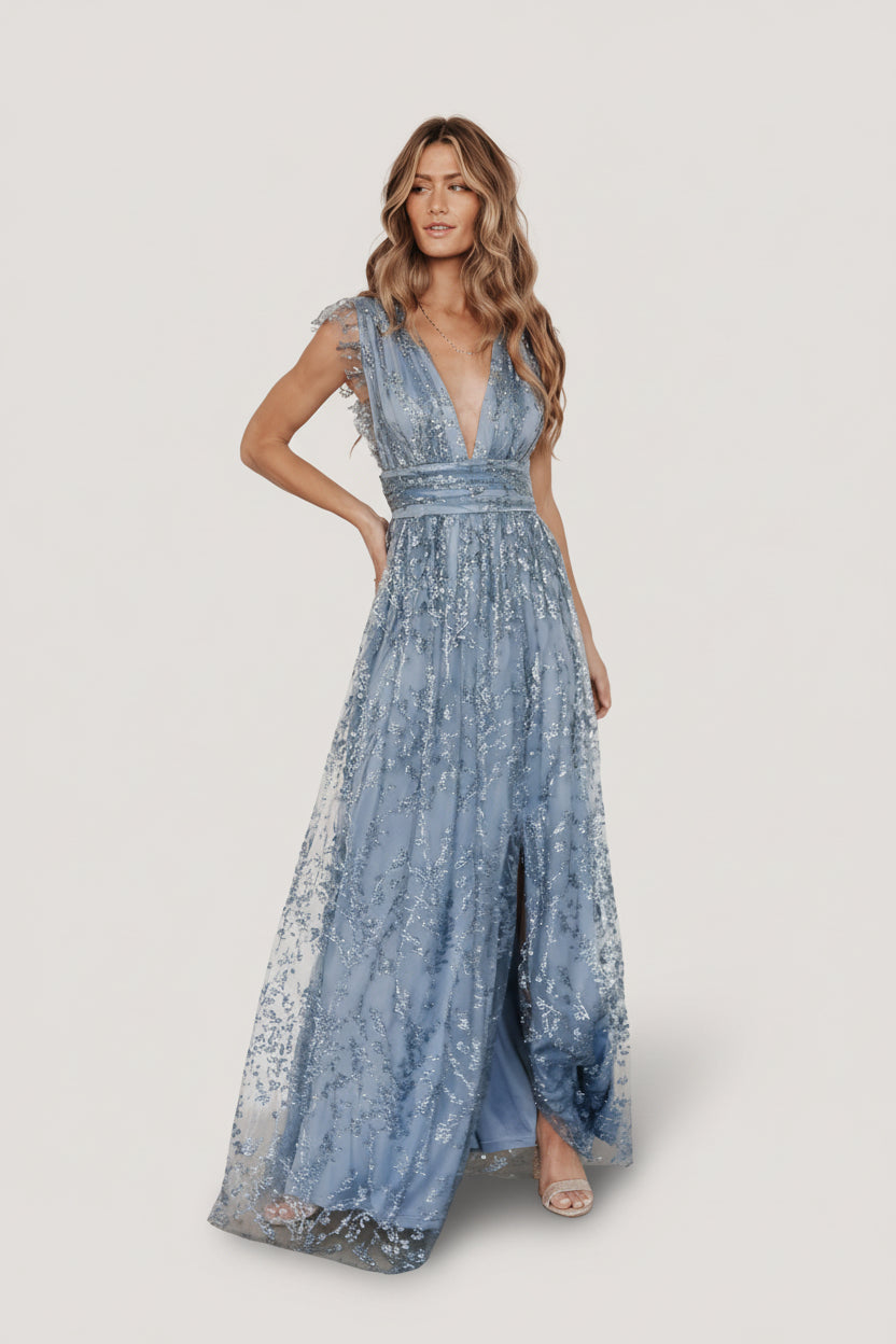 Detailed image of the dress fabric and glitter finish on the Arlene Shimmer Gown in Winter Blue, note that glitter may shed with wear and handling.