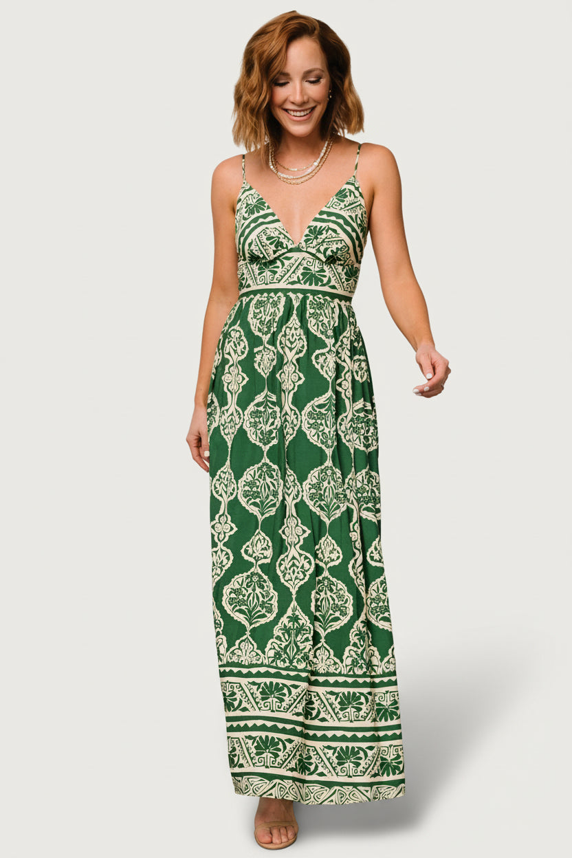 Close-up of the green and cream pattern and woven fabric texture, showing color contrast and fine print detail on the dress.