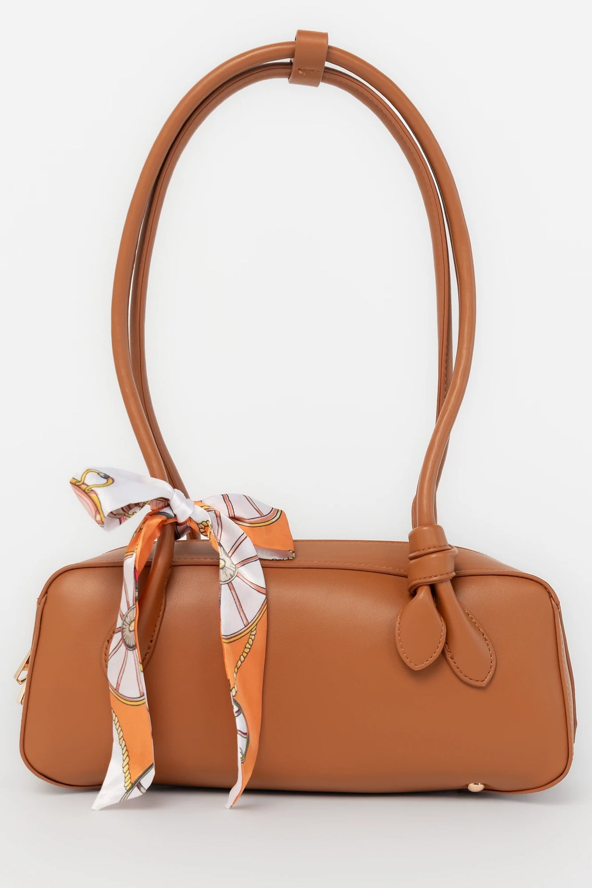 Harmony Mini Shoulder Bag in Camel with gold zipper hardware, removable bow, shoulder strap, and interior pockets.