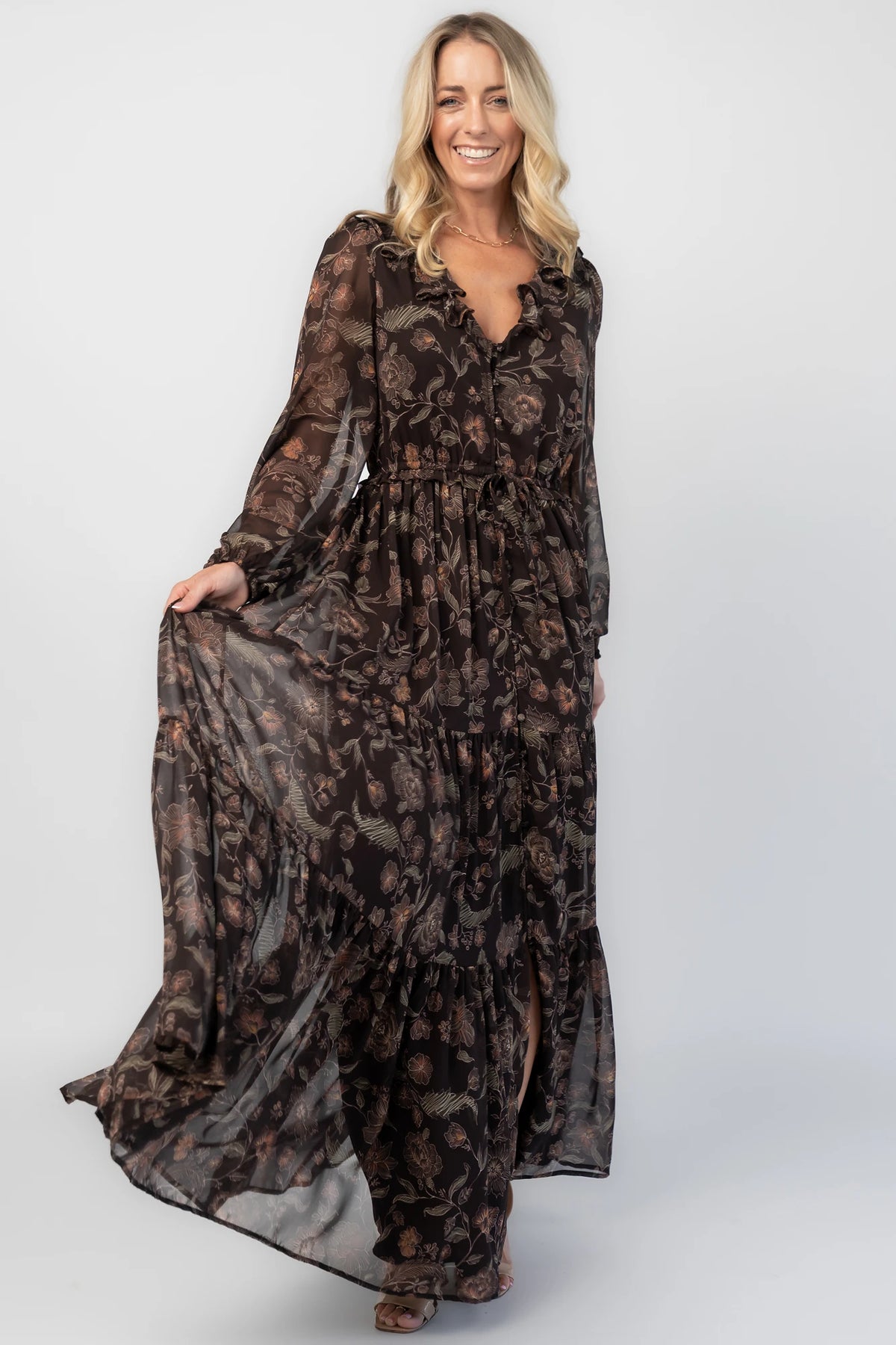 Jesslyn Maxi Dress in Brown Multi with V-neckline, ruffle trim, and button-down front.