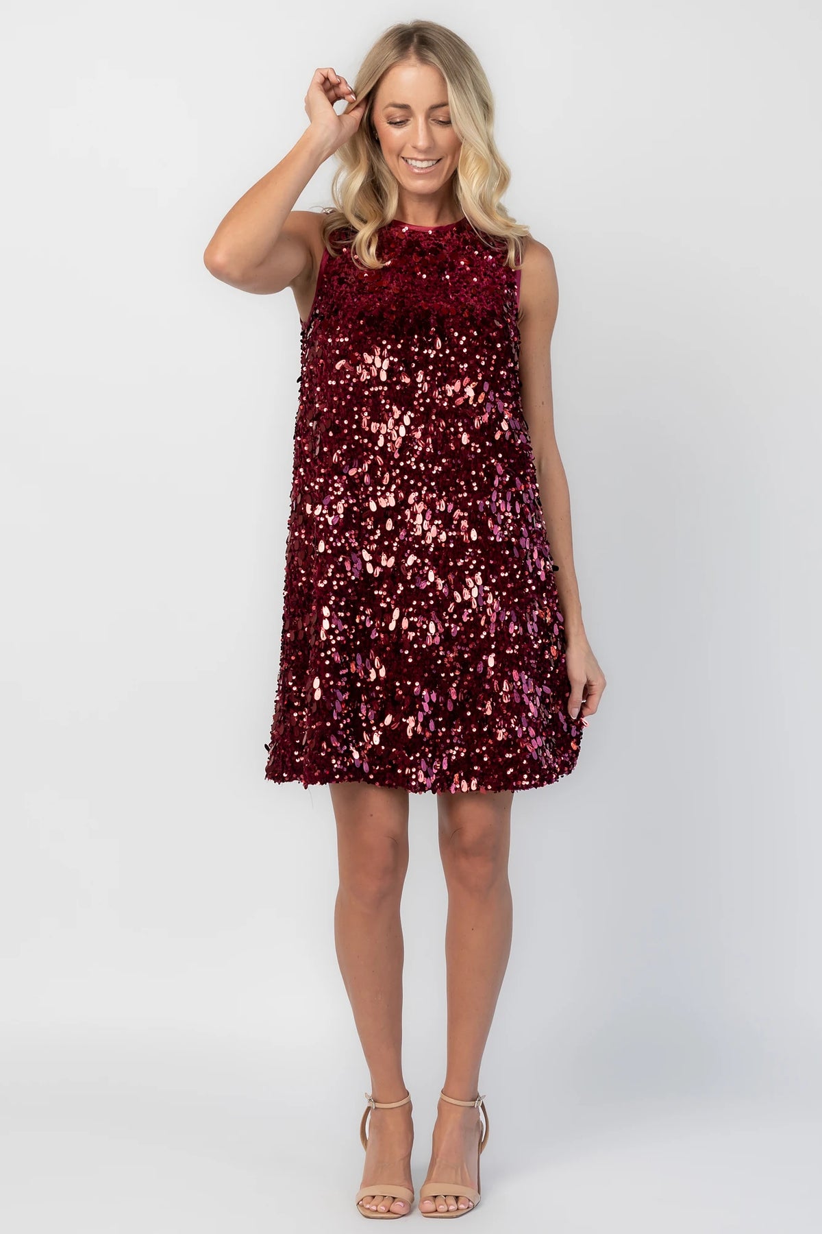 Jolene Sequin Short Dress in Wine with allover sequin detailing, a sleeveless silhouette, and a round neckline.