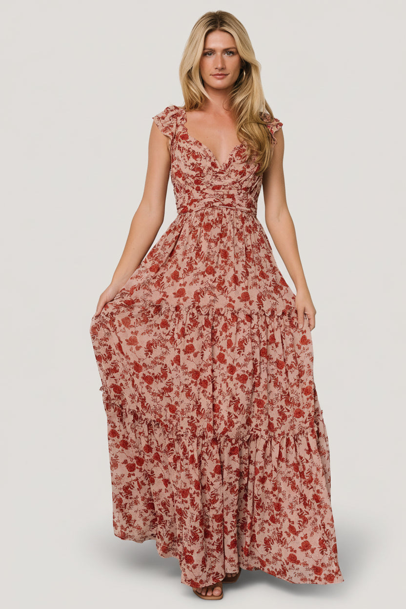 Fabric and pattern close-up of blush background with rich red floral print on lightweight chiffon, showing texture and color depth.