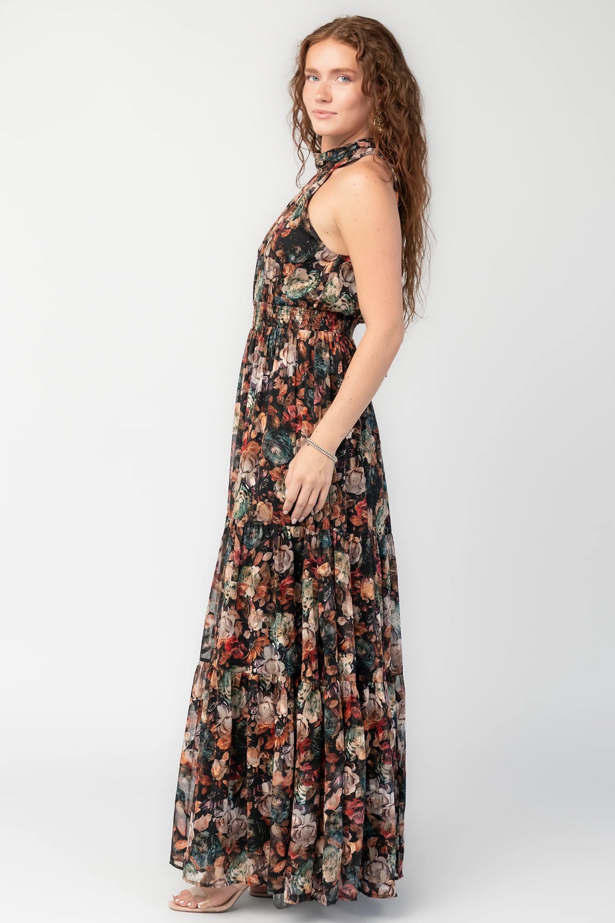 Pulitzer Maxi Dress in Black Multi Floral with halter neckline, smocked waist, tie-back detail, and tiered chiffon skirt.