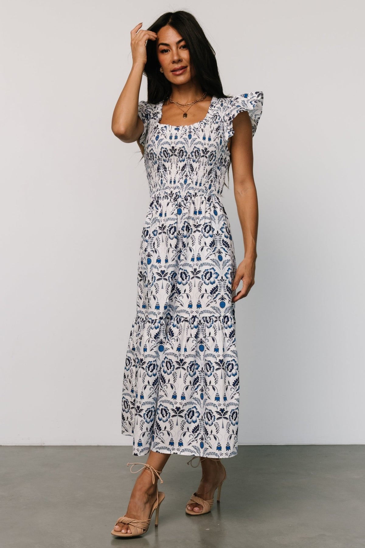 Detail image of fabric and print showing multi-shade blue floral pattern on crisp 100% cotton with visible texture and weave.
