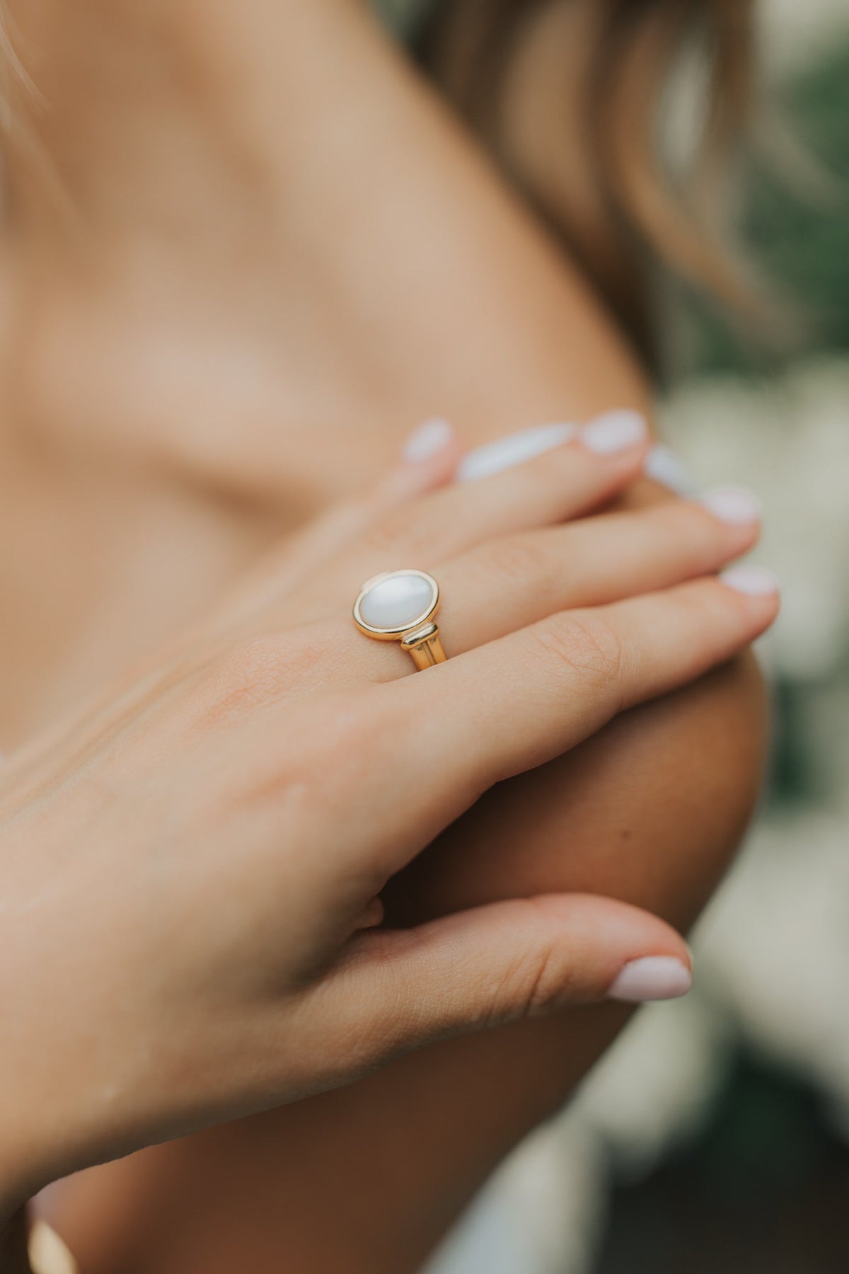Lifestyle image of Broadwater ring arranged with delicate bands to illustrate stacking options and the ring's versatile, timeless aesthetic.