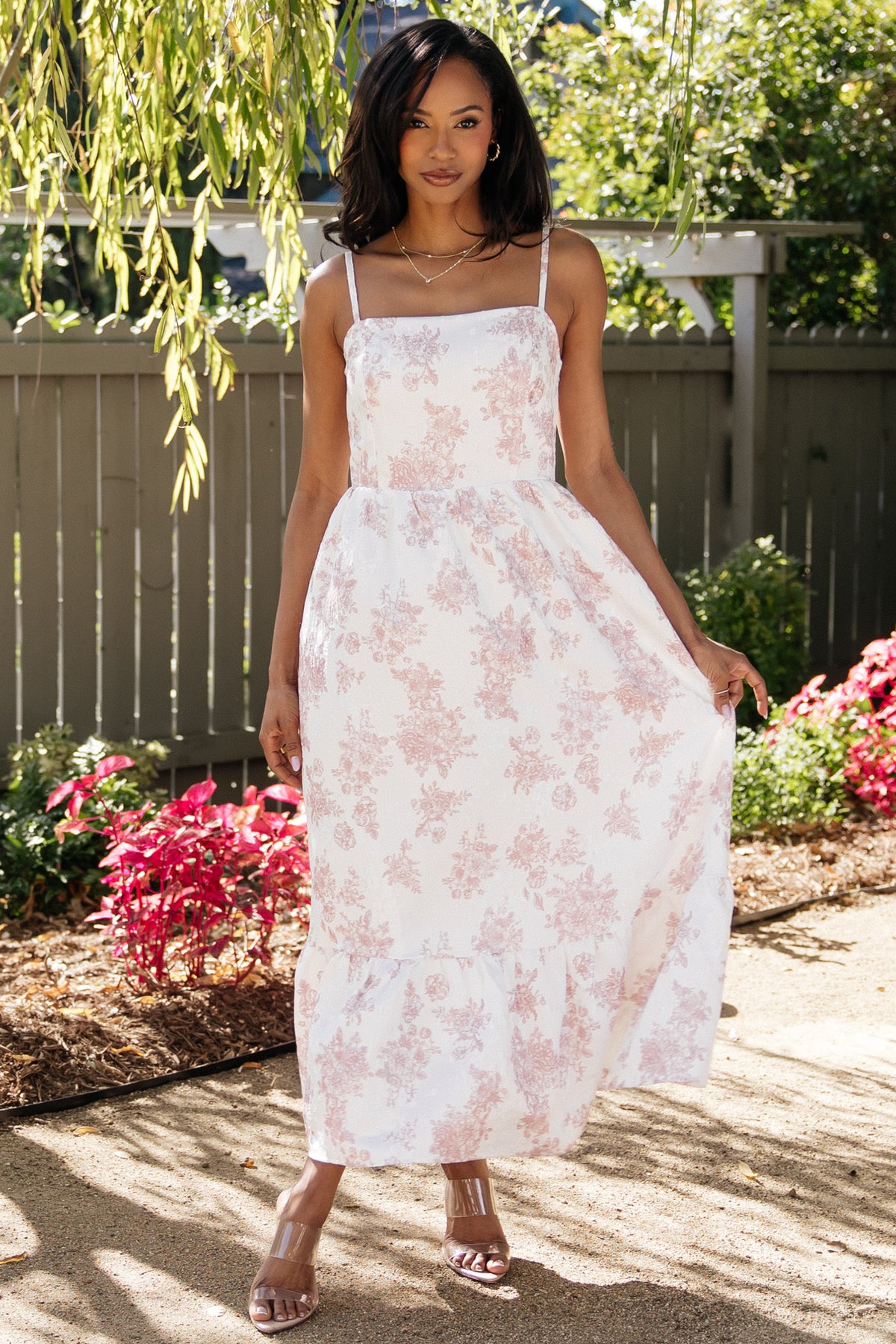 Front view of off-white Cherie jacquard midi with pink florals, square neckline, adjustable straps and side pockets.