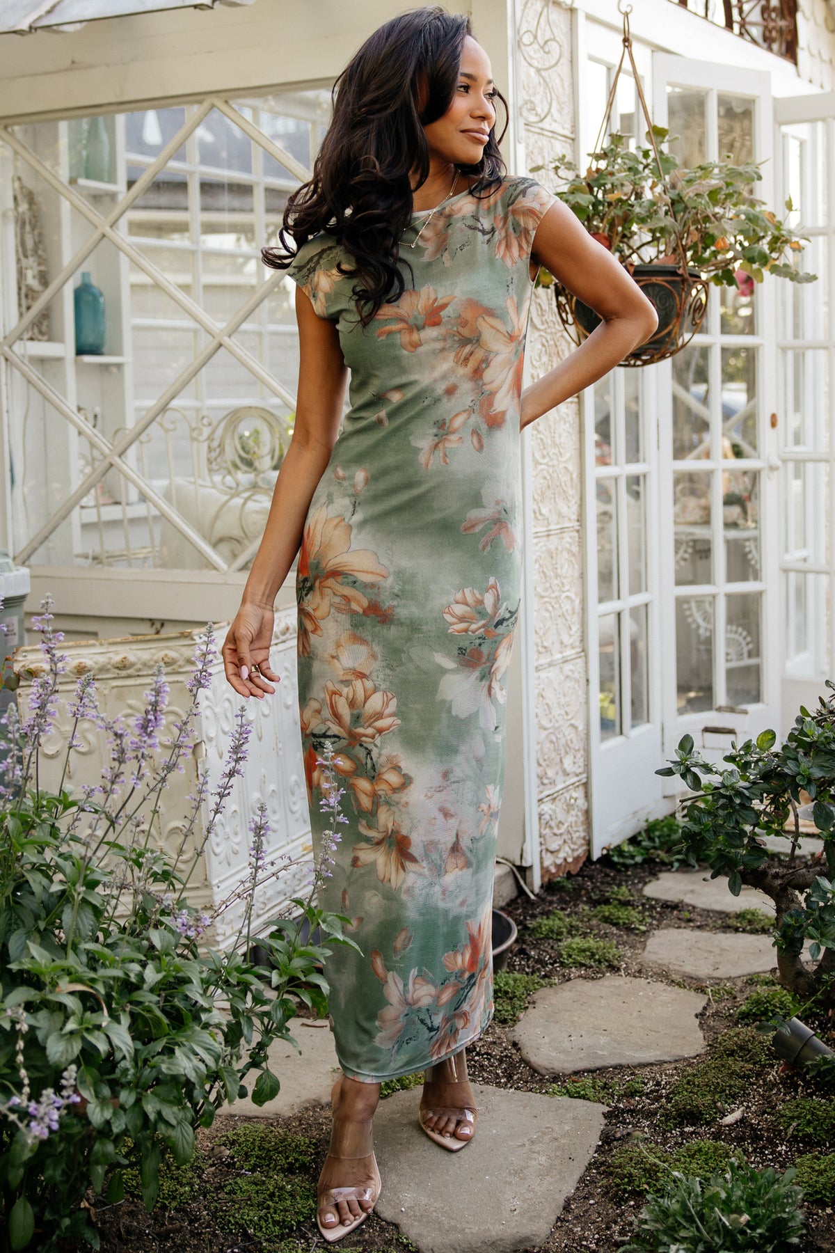 Front view of Daniela mesh midi dress in dusty sage floral with included ribbed slip, model standing in studio lighting.