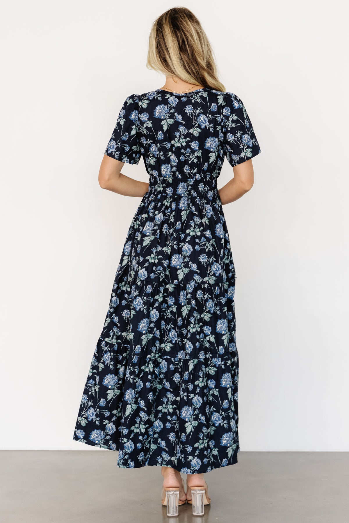 Side view of Kristin Maxi Dress demonstrating functional side pockets, unlined cotton fabric and relaxed tiered skirt drape on model.