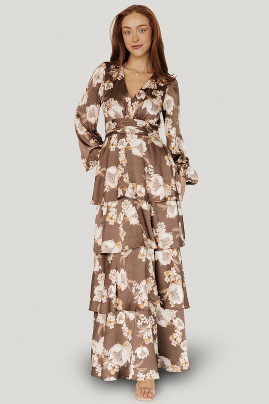 Front full-length view of mocha floral satin maxi dress with V-neck, contoured under-bust panel and tiered cascading ruffle skirt.