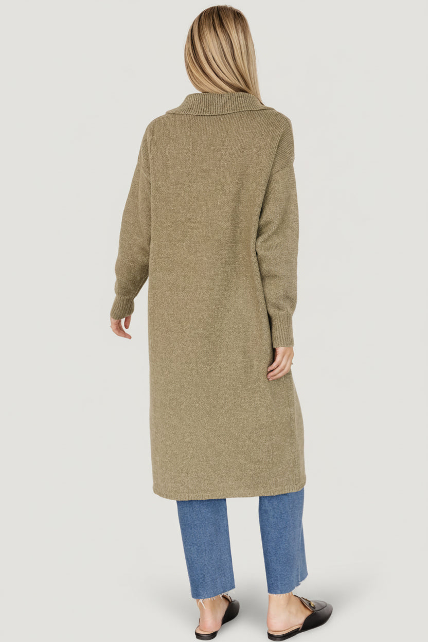 Detail image of patch pocket and small wide-ribbed bottom hem on the heathered olive longline cardigan.