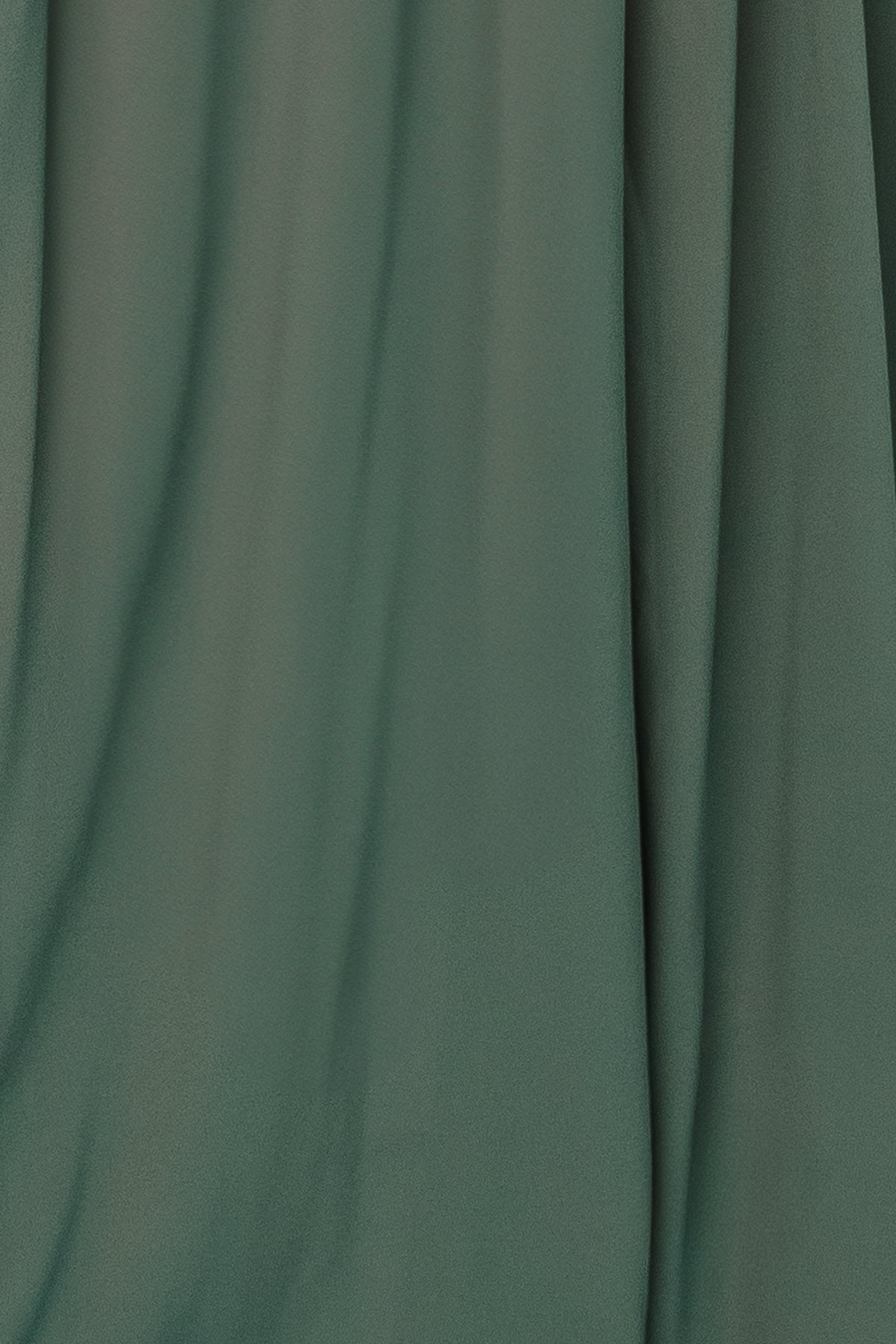 Close-up of Dark Sage Victoria chiffon fabric swatch on white background showing sheer, lightweight texture and soft drape for dressmaking.