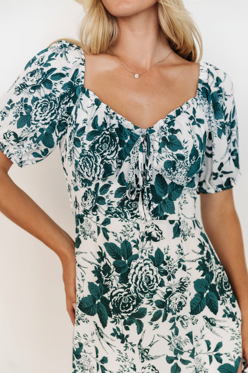 Close-up of bodice showing smocked back, sweetheart peasant neckline with ruffle, and the faux tie detail on the Cadence Midi Dress.