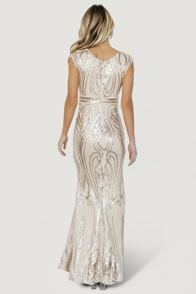 Full-length image of Alessia Sequin Gown in champagne on model, illustrating mermaid fit and floor-length hem.