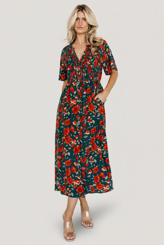 Polagram Botega Midi Dress front view in jade multi floral on model, ruffled notched neckline, smocked bodice, button-front, and flowing midi hem.