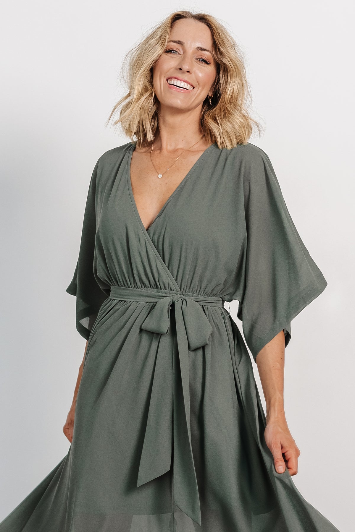 Flat-lay of Kia Chiffon Dark Sage swatch highlighting true color, translucence, and woven chiffon for color matching.