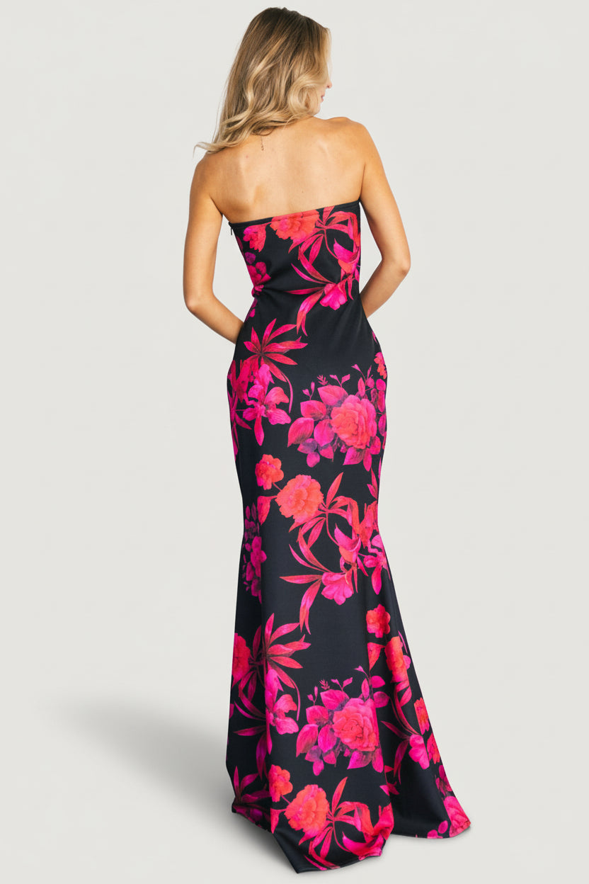 Side profile of the Alicante dress highlighting the trumpet skirt silhouette and structured heavyweight knit fabric with subtle stretch.