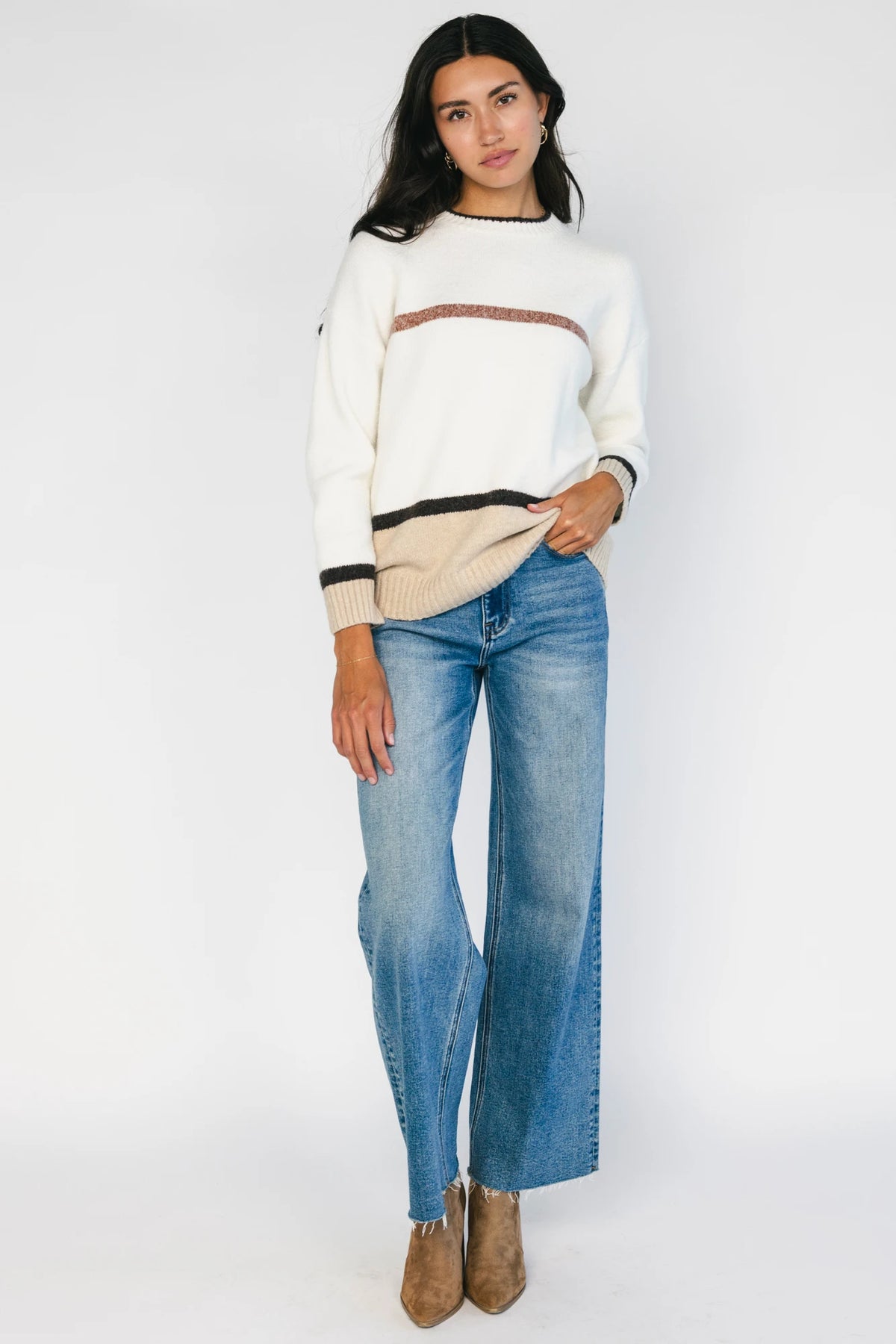 Natural color-block sweater with horizontal tan and brown stripes, a round neckline, long sleeves, and a relaxed fit.