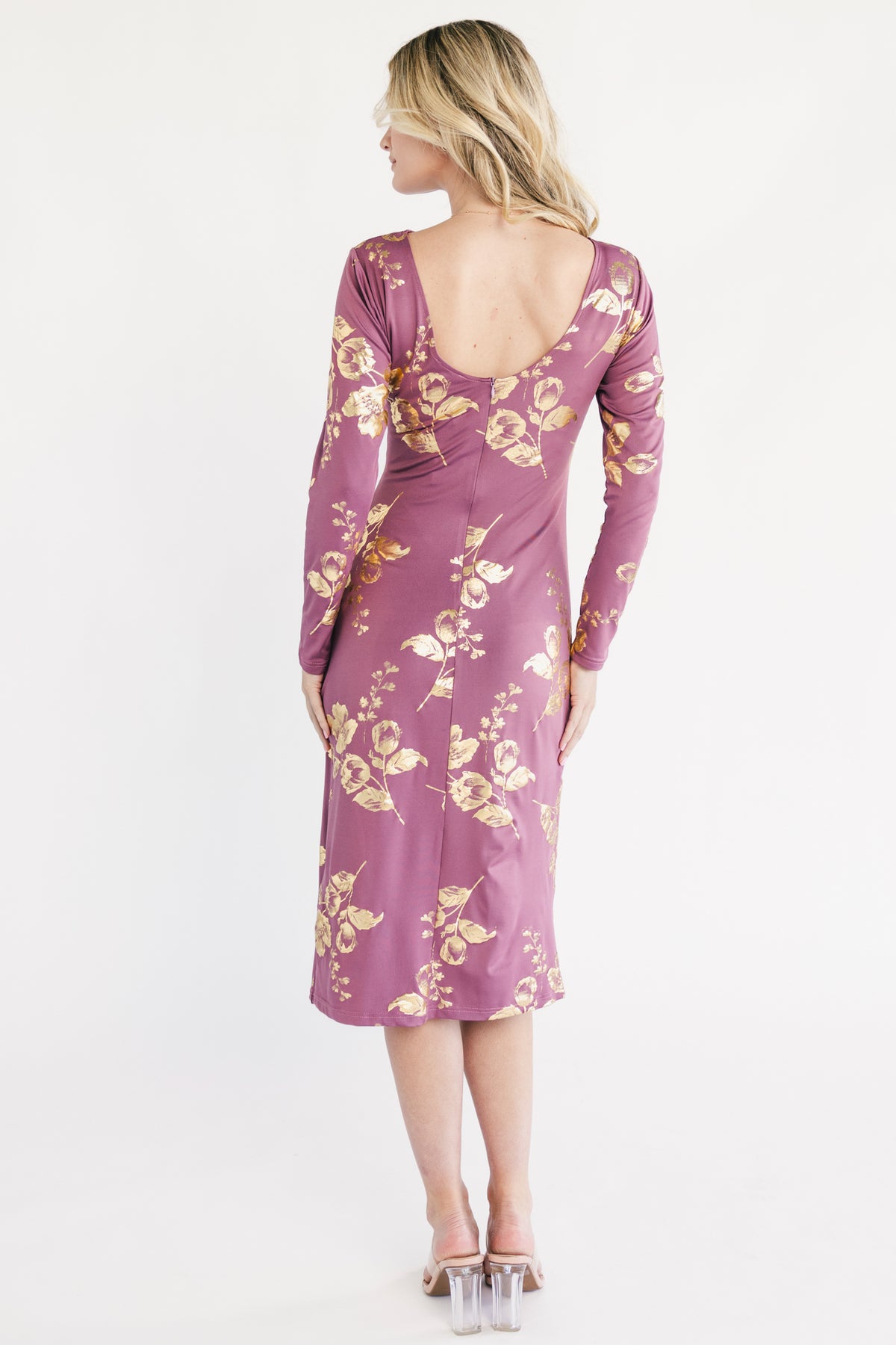 Close-up of knit fabric and gold metallic floral motif on the Valeria Midi Dress, showing texture, stretch, and woven detail.