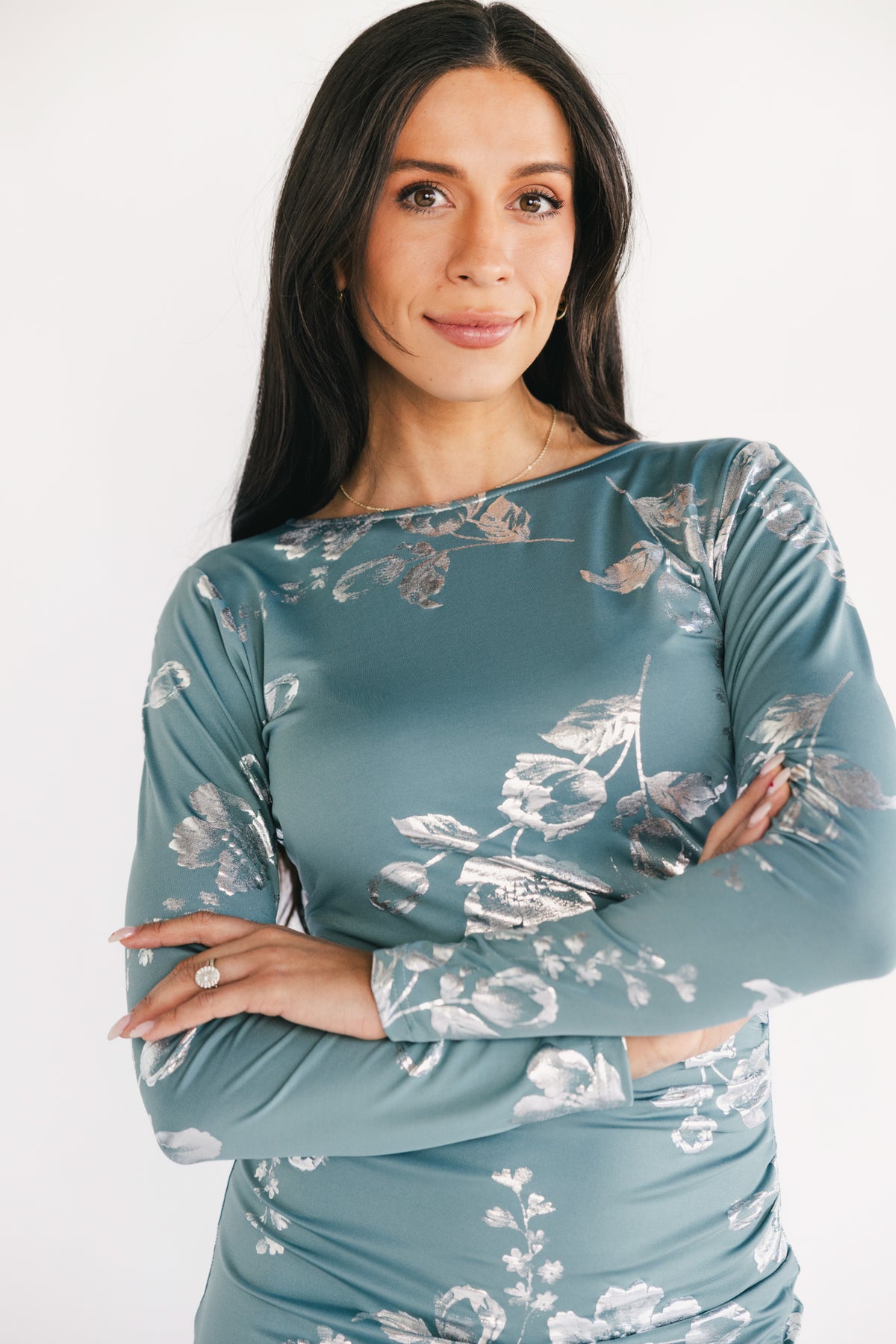 Back view showing scoop back and hidden zipper on the Valeria Midi Dress in vintage teal with metallic floral pattern and fitted bodice.