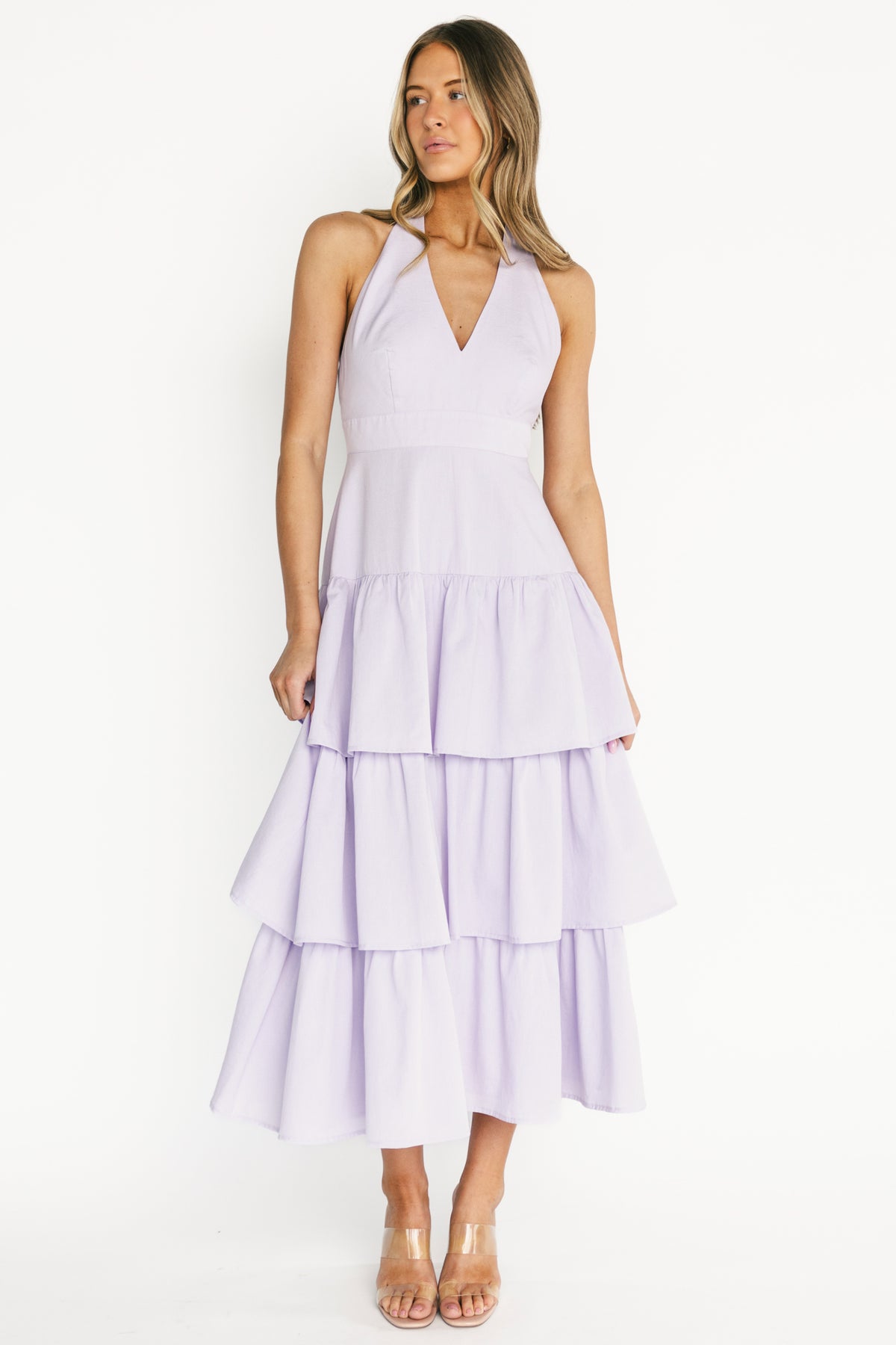 Front view of Savannah Tiered Maxi Dress in light purple on model, showing halter neckline and tiered ruffle skirt.