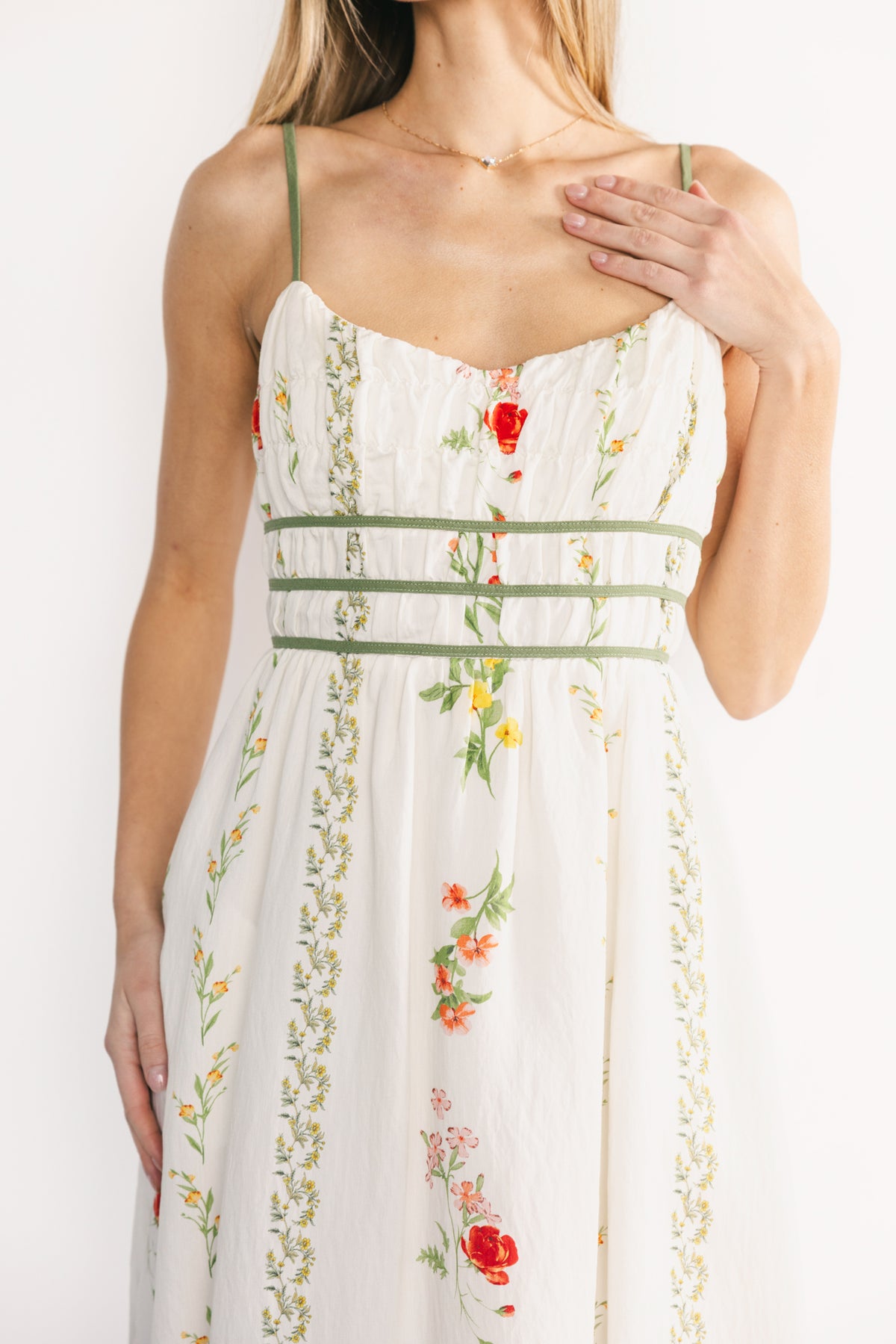 Model wearing Cerise Midi Dress styled with sandals, showing full-length silhouette, lining, and natural drape at midi length.