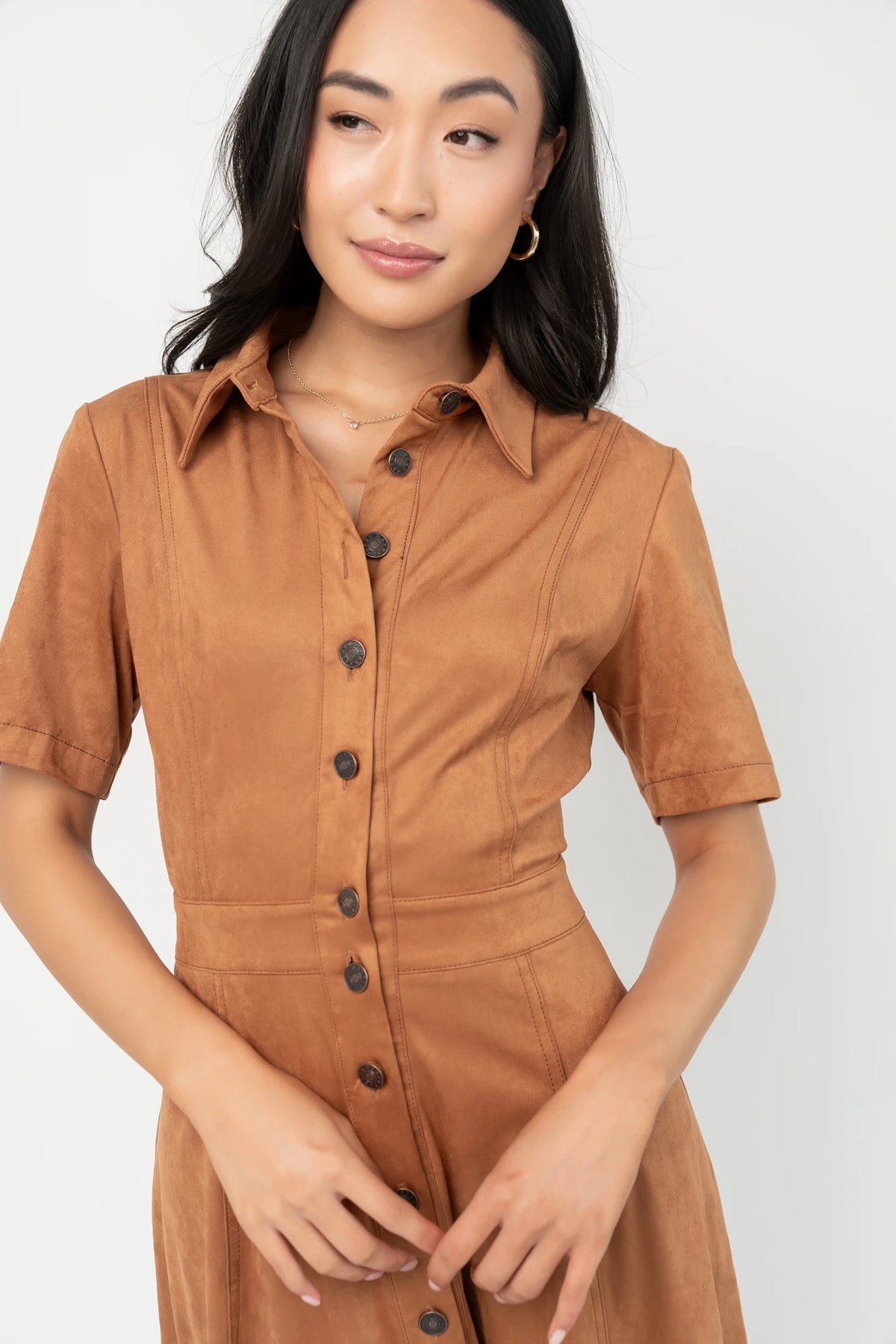 Fifth Avenue Button Up Dress in Camel with faux suede finish, collared neckline, button front, and A-line midi skirt.