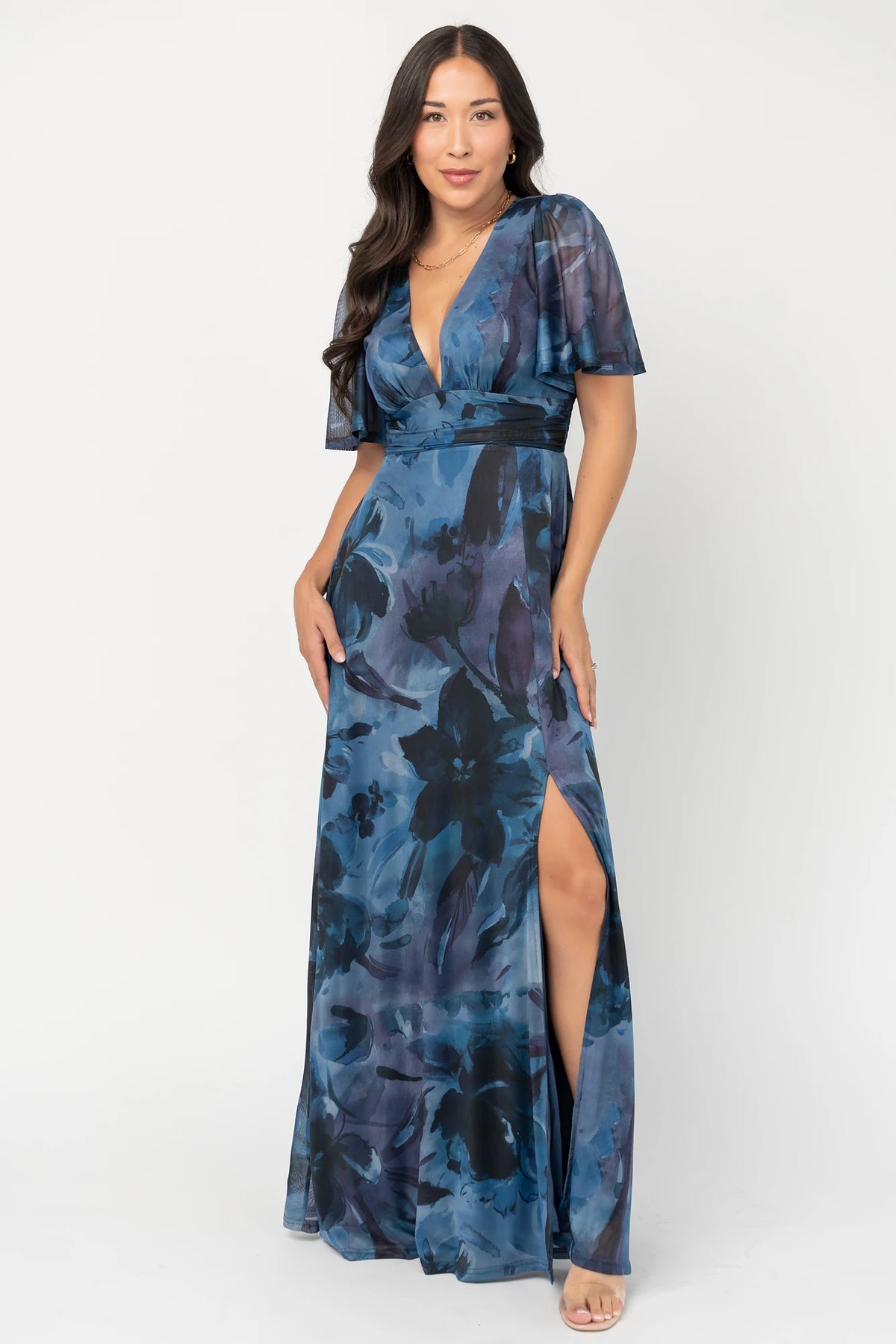 Arianne Mesh Maxi Dress in Midnight Floral with deep V-neck, flutter sleeves, empire waist, floral print, and leg slit.