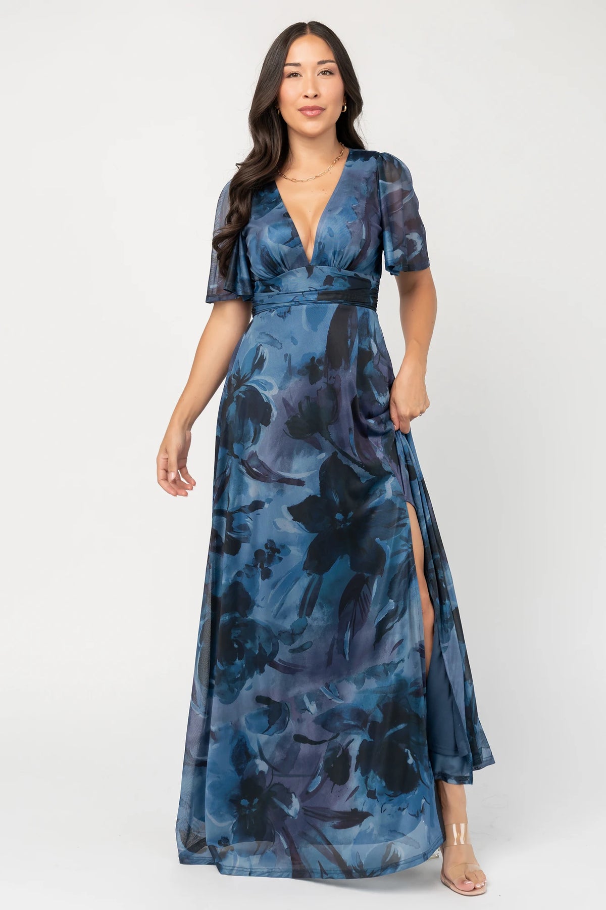Arianne Mesh Maxi Dress in Midnight Floral with deep V-neck, flutter sleeves, empire waist, floral print, and leg slit.