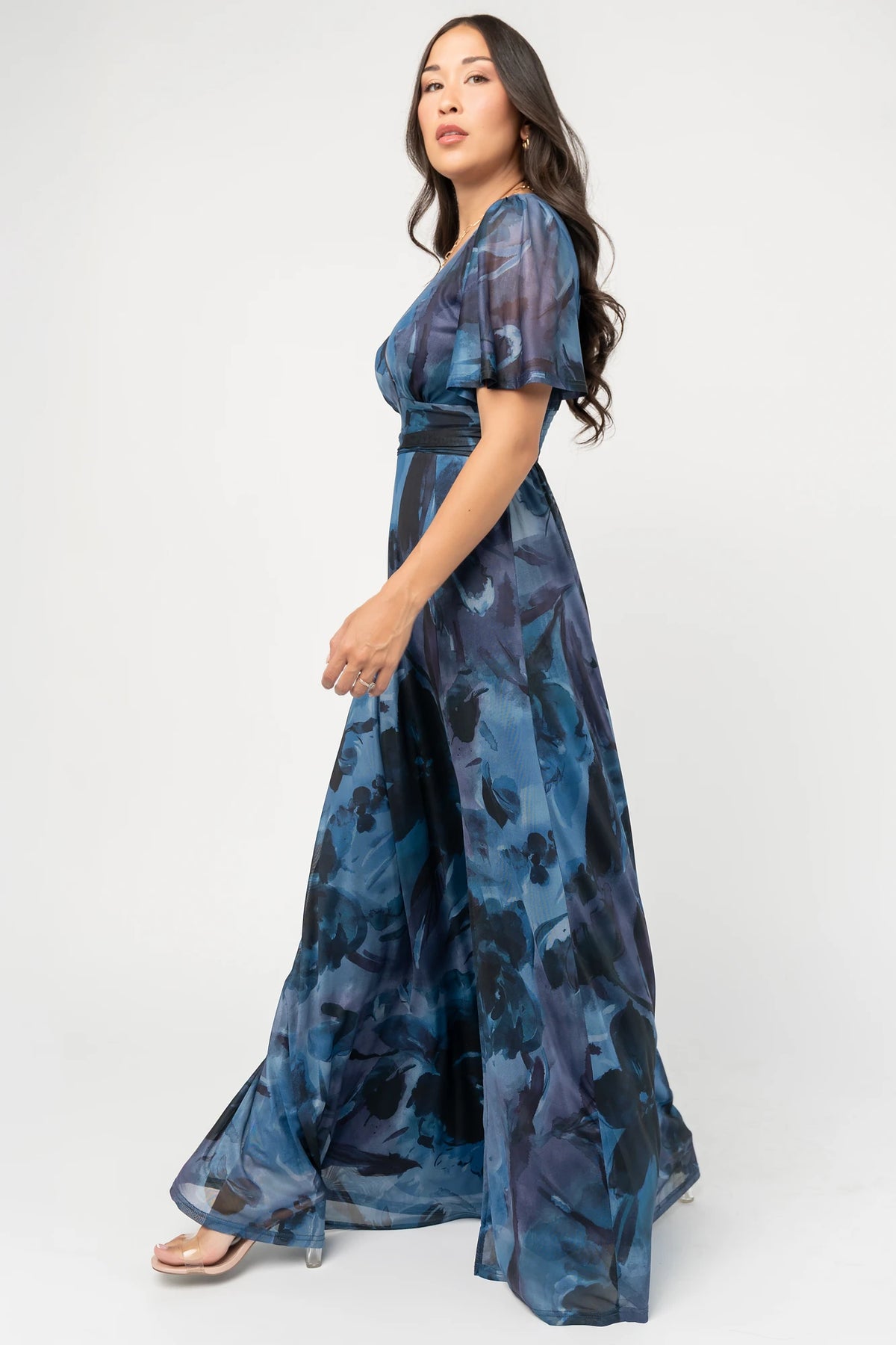 Arianne Mesh Maxi Dress in Midnight Floral with deep V-neck, flutter sleeves, empire waist, floral print, and leg slit.