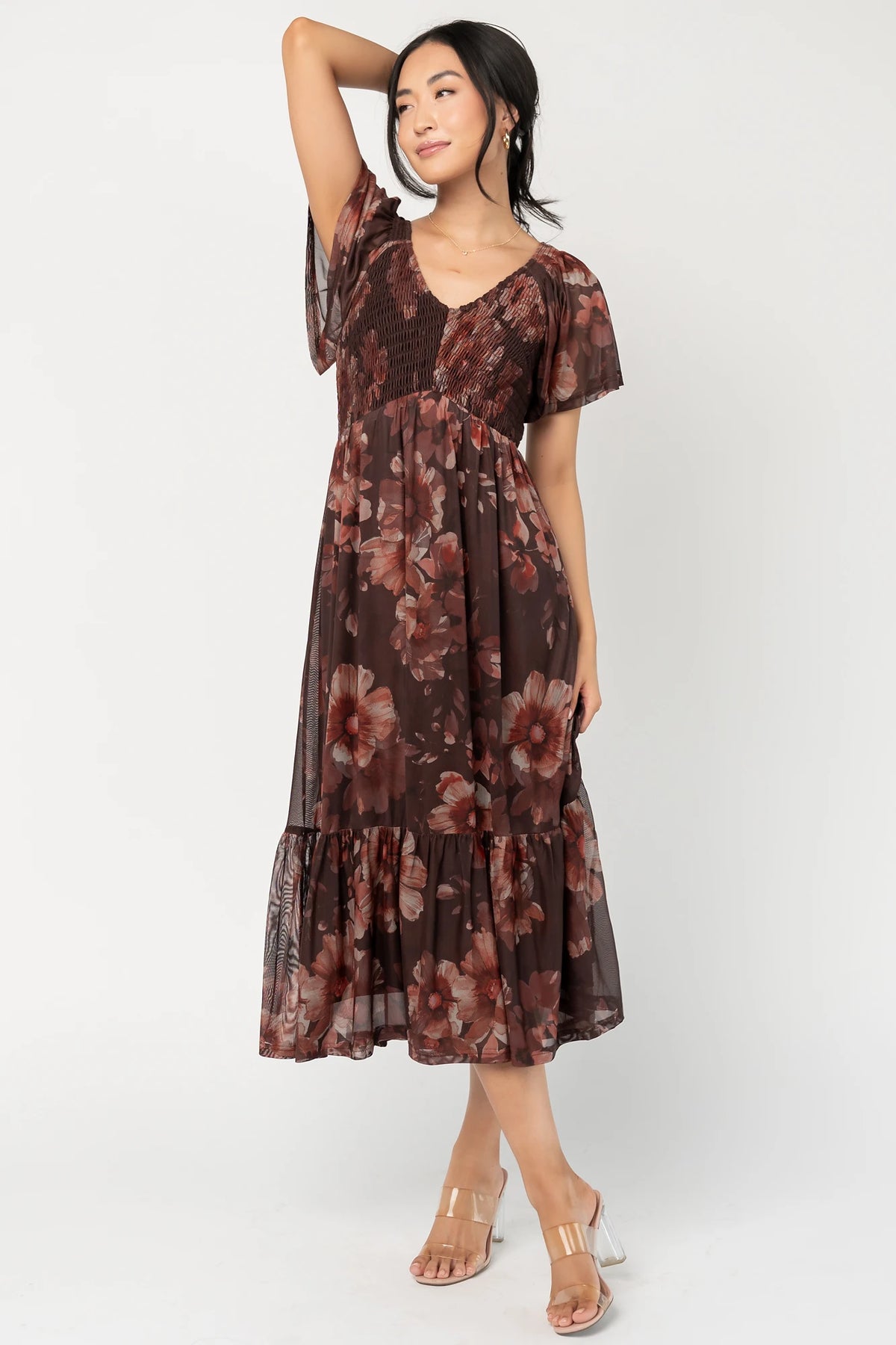 Livia Mesh Midi Dress in Brown + Rust Floral with V-neckline, smocked bodice, flutter sleeves, and tiered hem.
