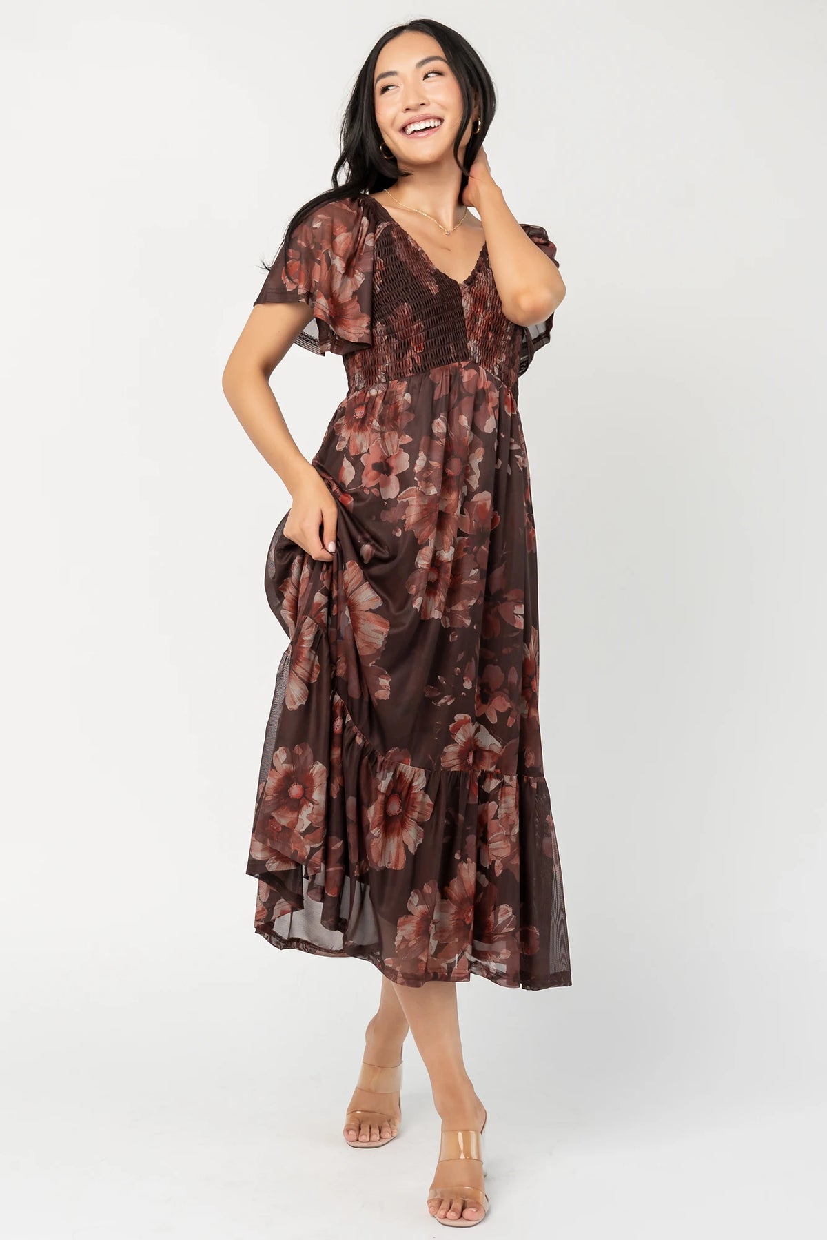 Livia Mesh Midi Dress in Brown + Rust Floral with V-neckline, smocked bodice, flutter sleeves, and tiered hem.