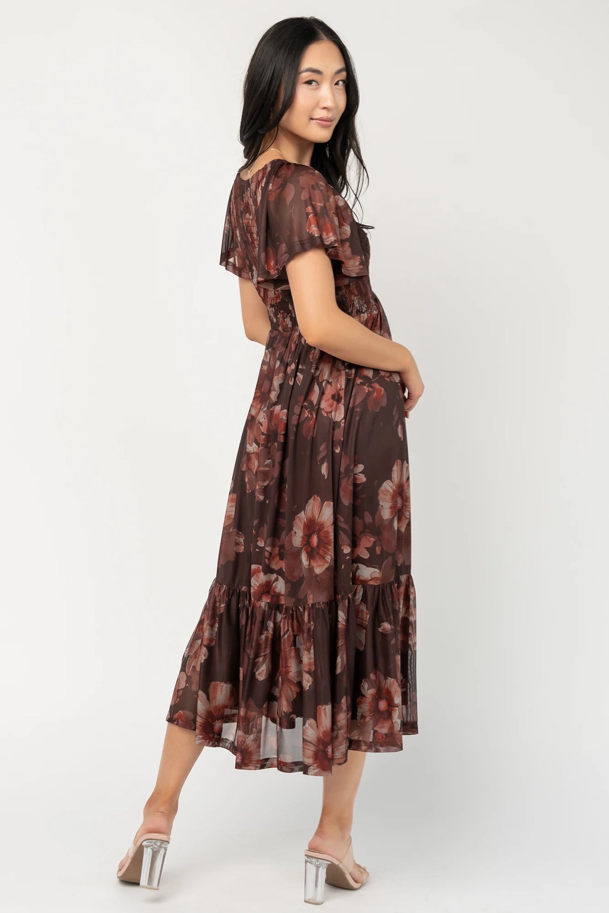 Livia Mesh Midi Dress in Brown + Rust Floral with V-neckline, smocked bodice, flutter sleeves, and tiered hem.