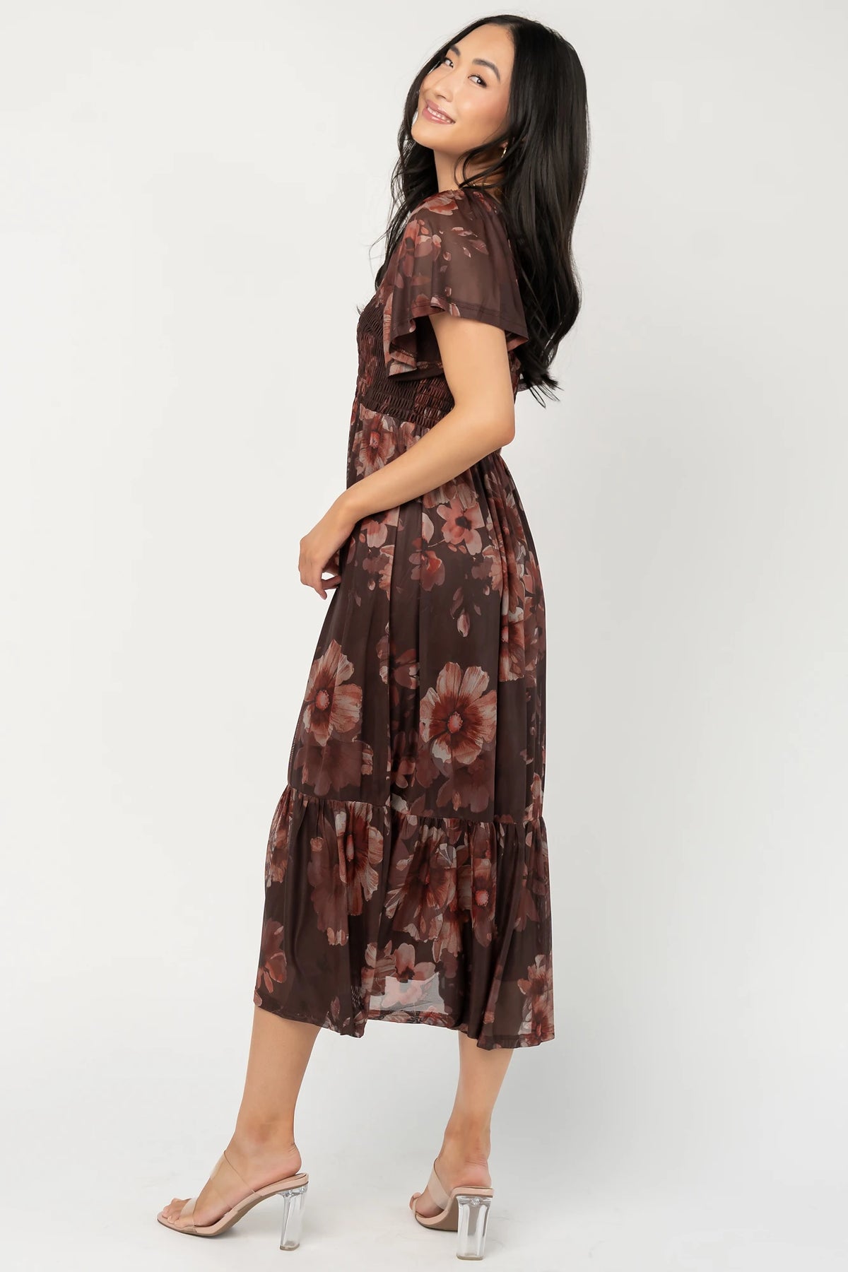 Livia Mesh Midi Dress in Brown + Rust Floral with V-neckline, smocked bodice, flutter sleeves, and tiered hem.