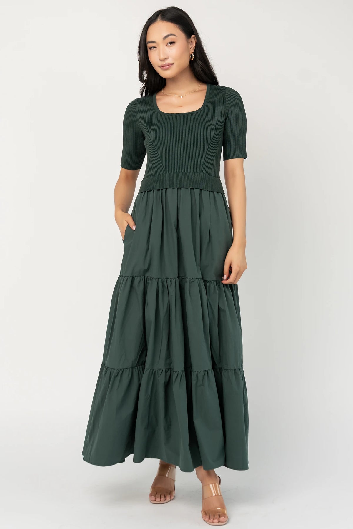 Astra Tiered Dress in Winter Green with ribbed knit bodice, scoop neckline, short sleeves, and tiered cotton skirt.