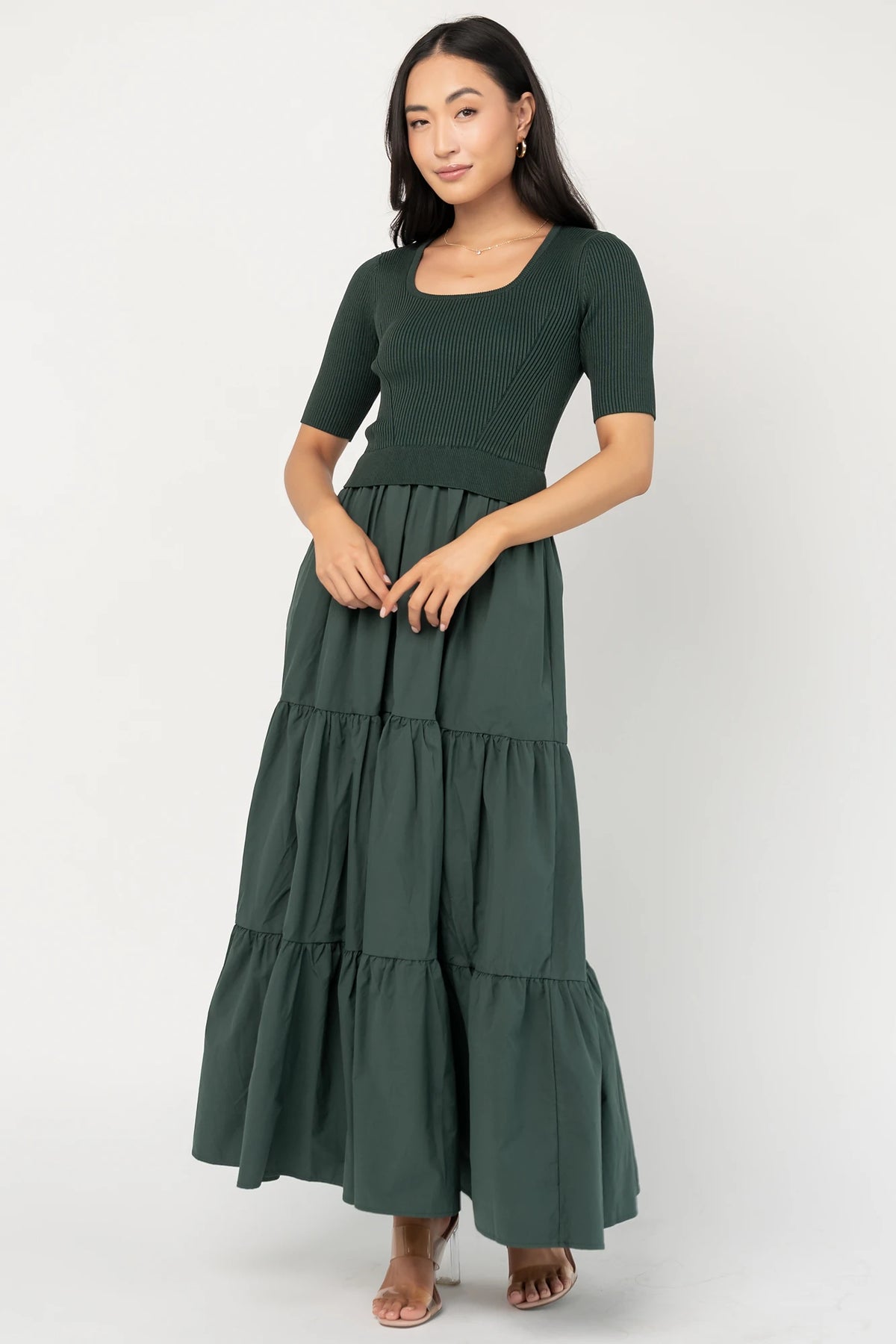 Astra Tiered Dress in Winter Green with ribbed knit bodice, scoop neckline, short sleeves, and tiered cotton skirt.