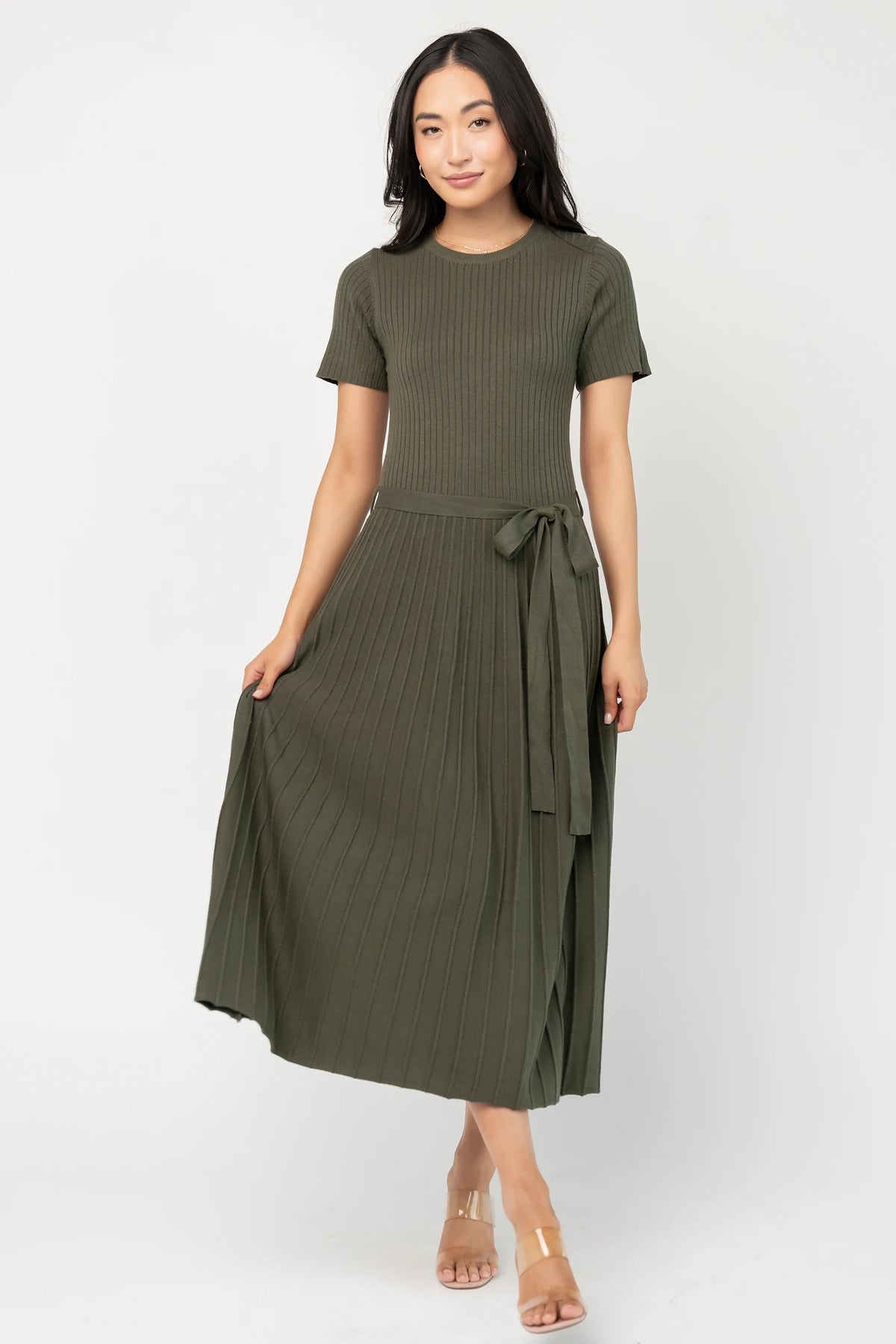 Jessamine Midi Dress with ribbed sweater knit, crew neckline, short sleeves, self-tie waist belt, and pleated skirt.