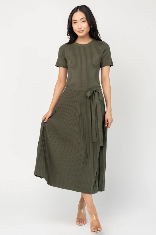 Jessamine Midi Dress with ribbed sweater knit, crew neckline, short sleeves, self-tie waist belt, and pleated skirt.