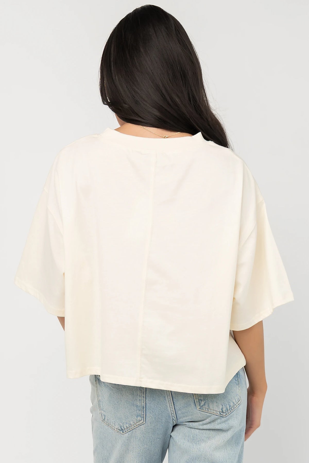 Jason Graphic Tee in Cream with vintage football graphic, gingham, lace and bow appliqué, crew neckline, and short sleeves.