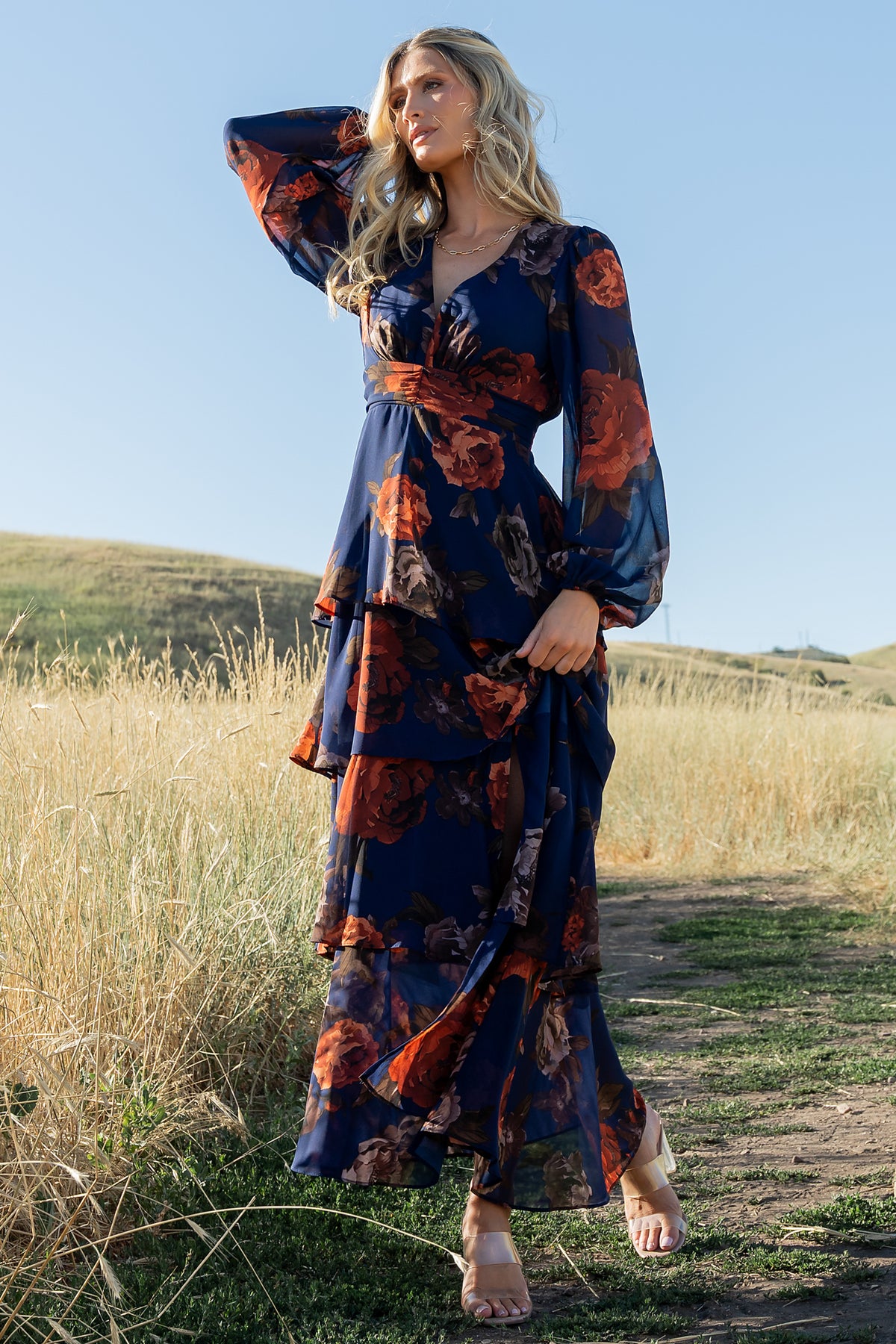 Detail of long puffed sleeve and unlined chiffon on Mariella dress, illustrating sleeve volume and lightweight fabric drape in floral print.