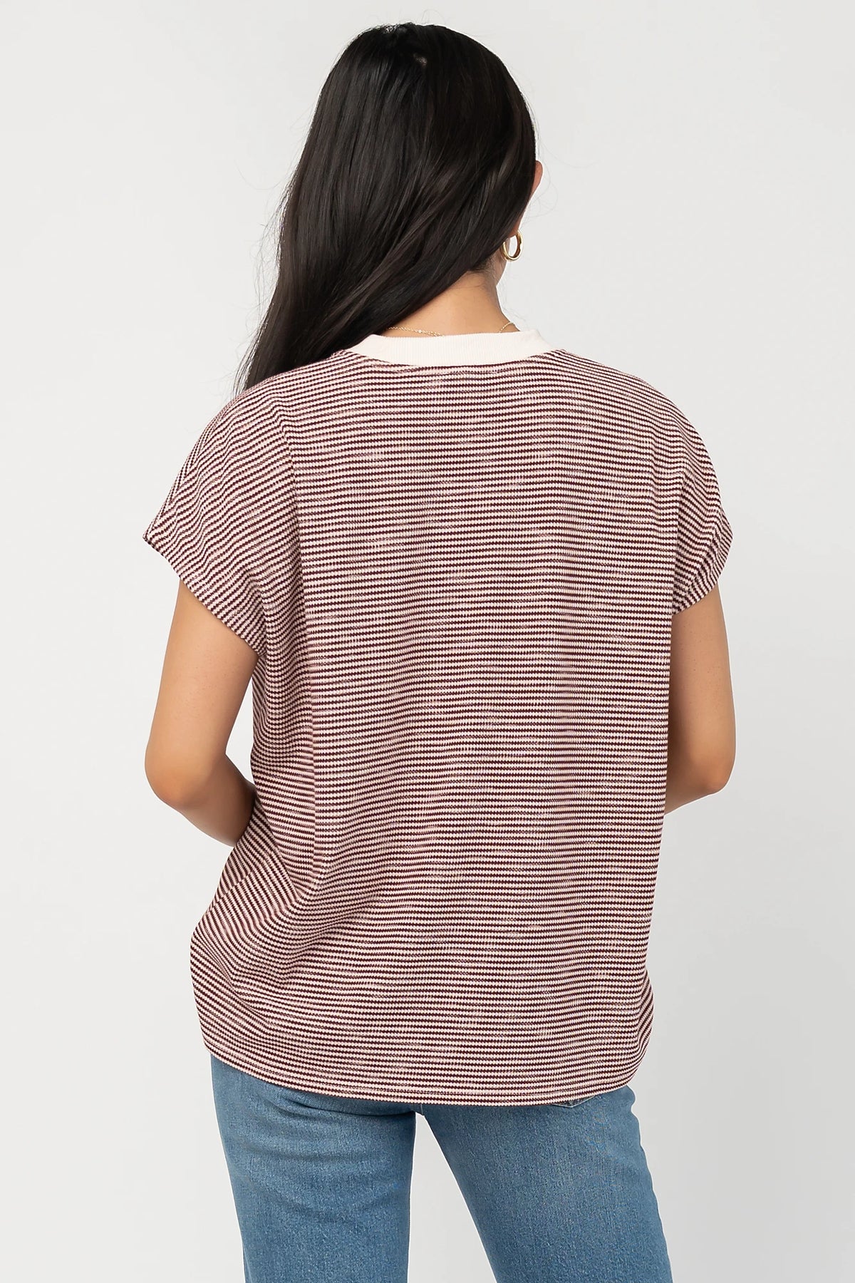 Millie Striped Top in Burgundy + Ivory with round neckline, short sleeves, side slits, and asymmetrical hem.