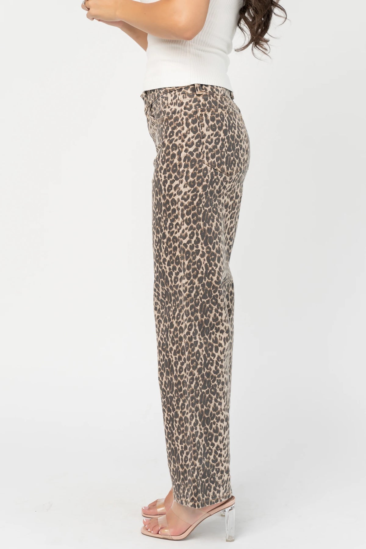 Leopard Print Wide Leg Pants with high-rise waist, button and zip closure, belt loops, and front and back pockets.
