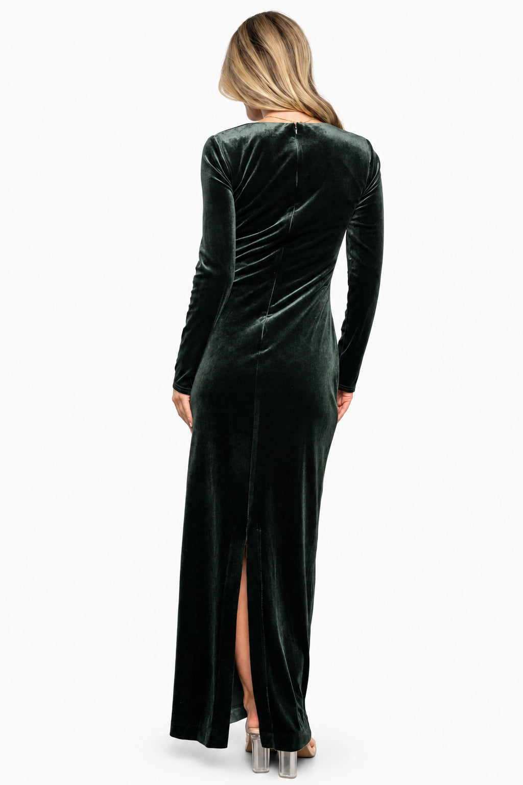 Back view of Kourtney velvet maxi dress in dark green showing discreet back slit, hidden zipper and flowing maxi hem.