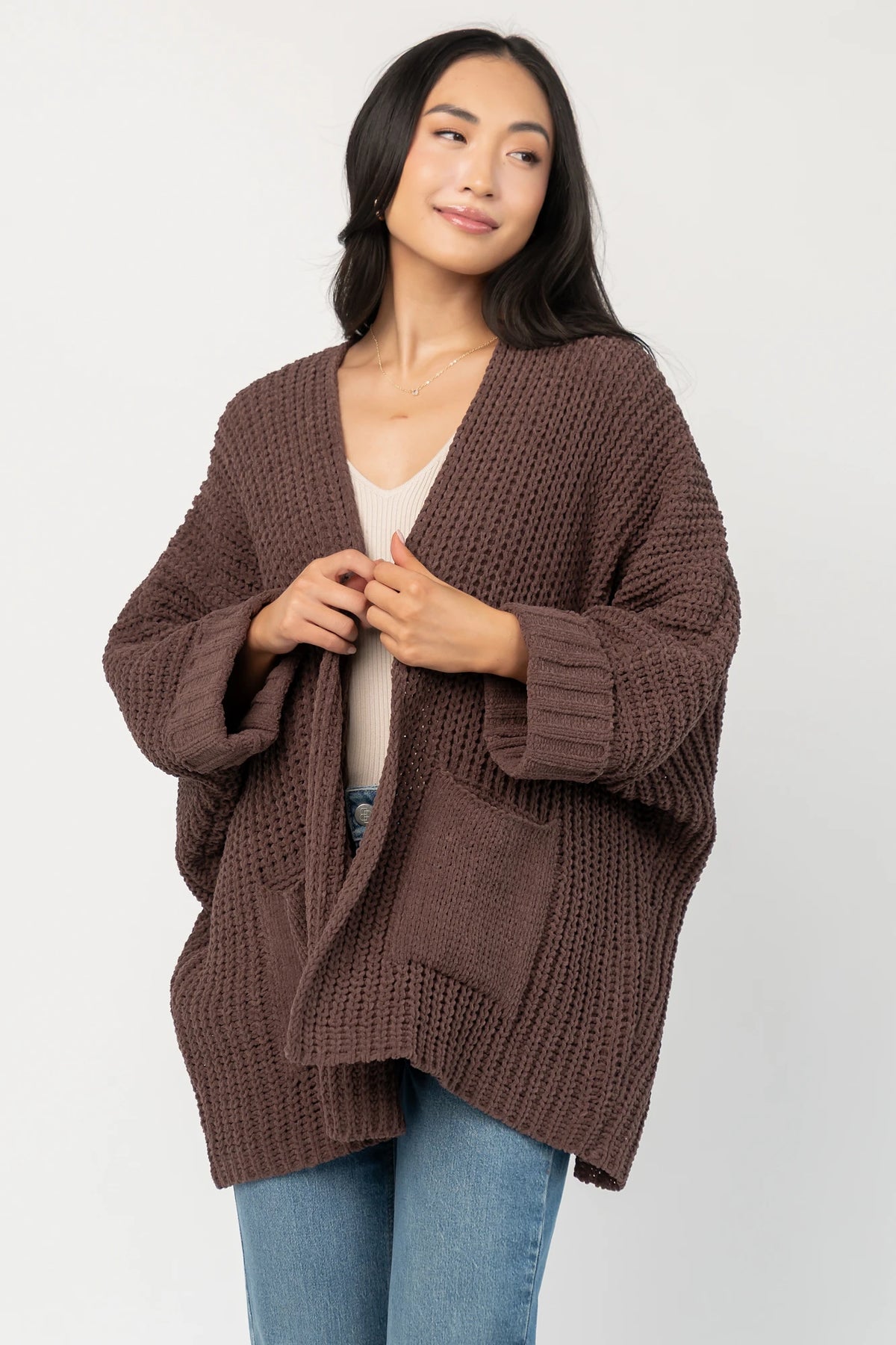 Cybele Oversized Cardigan in Dark Brown with soft chenille knit, open front, batwing sleeves, and patch pockets.